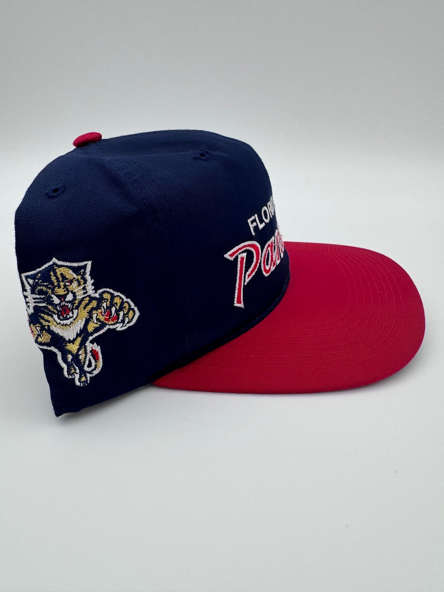 90S FLORIDA PANTHERS SCRIPT SPORTS SPECIALTIES SNAPBACK HAT NAVY