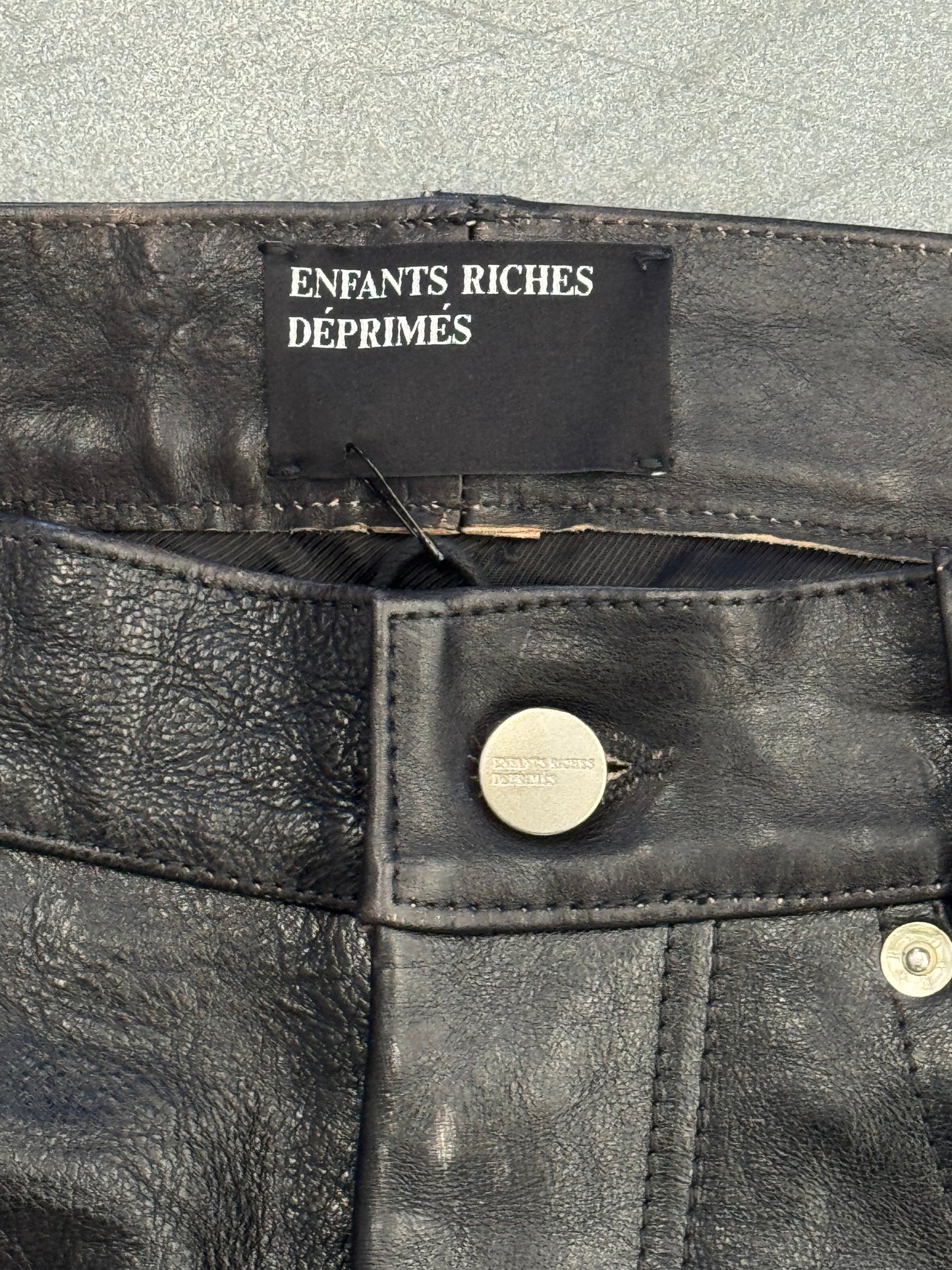 ENFANTS RICHES DEPRIMES ERD CRUST REPAIRED LEATHER FLARE JEANS - NWT