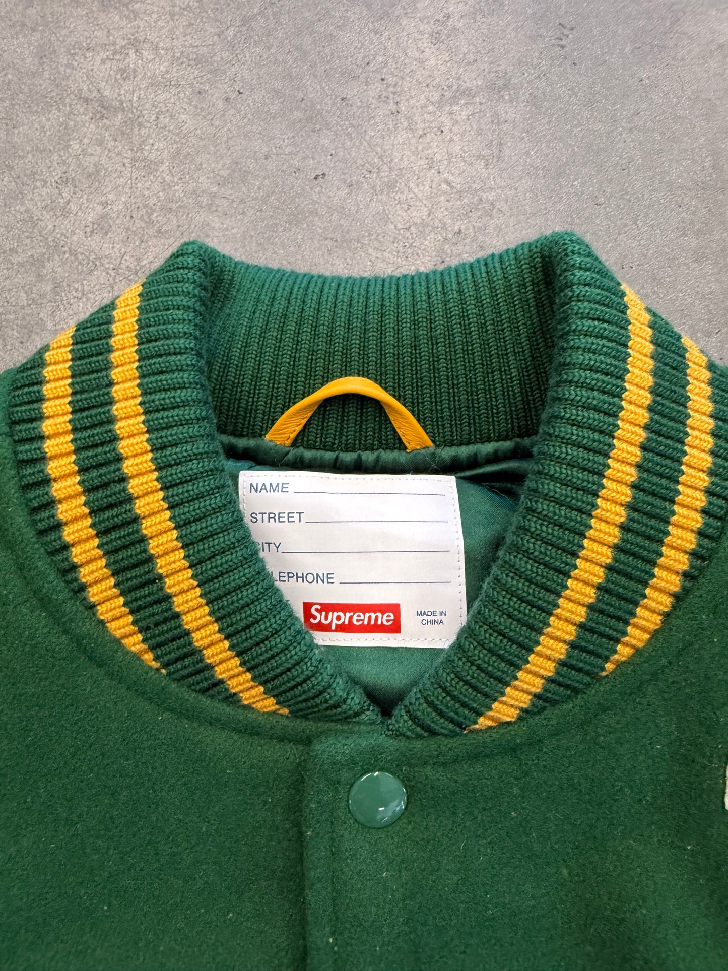 SS25 SUPREME PRAISES VARSITY JACKET - GREEN/YELLOW (NEW)