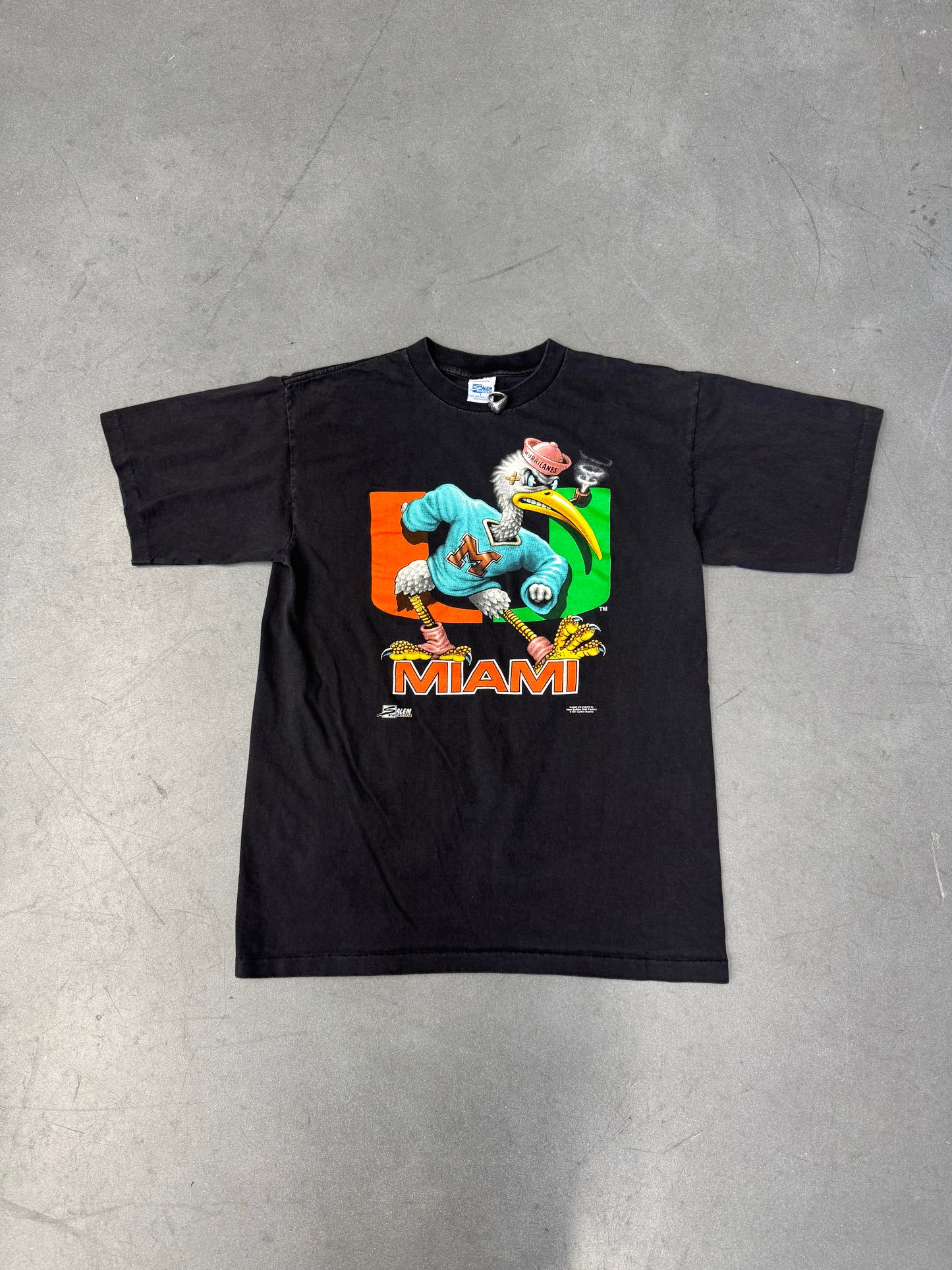1991 SALEM SPORTSWEAR UNIVERSITY OF MIAMI BLUE CREWNECK SEBASTIAN TEE