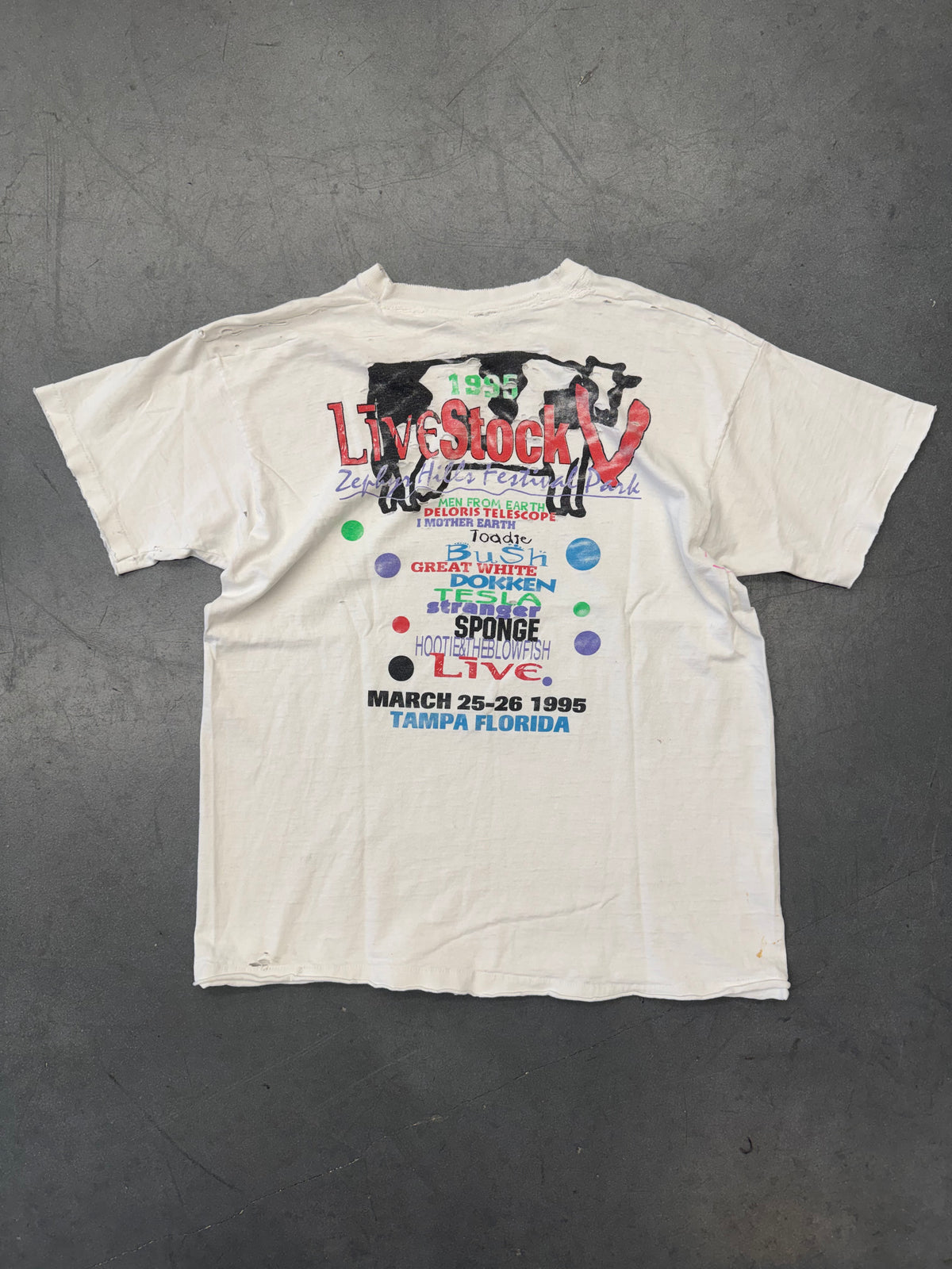 1995 LIVESTOCK V ZEPHYRHILLS FESTIVAL PARK THRASHED AND REPAIRED TEE (CUT FOTL TAG)