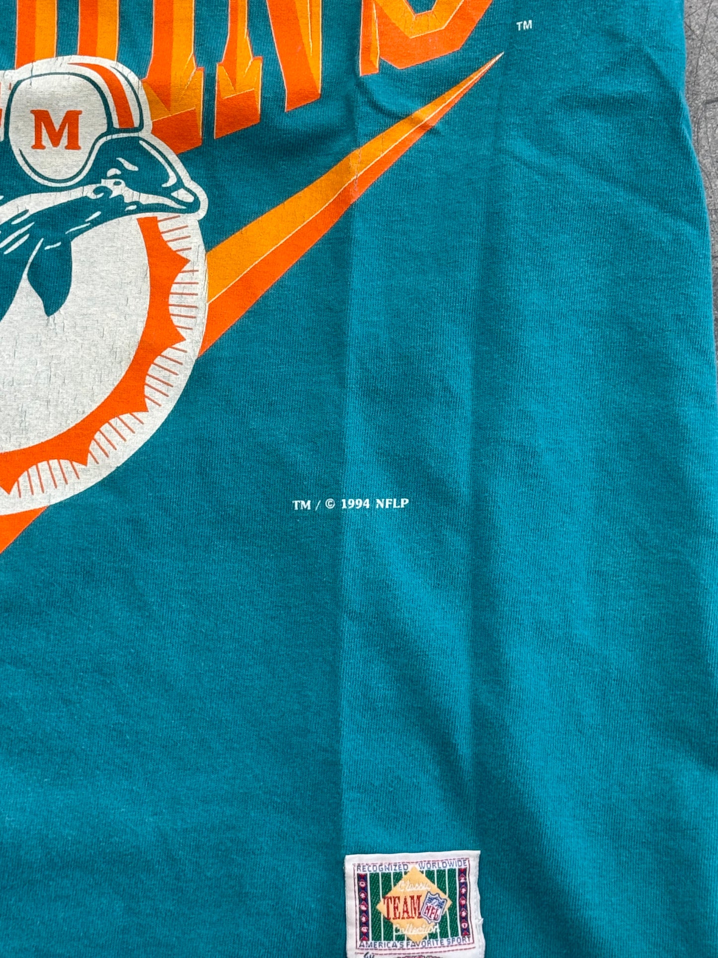 1994 MIAMI DOLPHINS NUTMEG MILLS CHEVRON LOGO SPELLOUT TEE