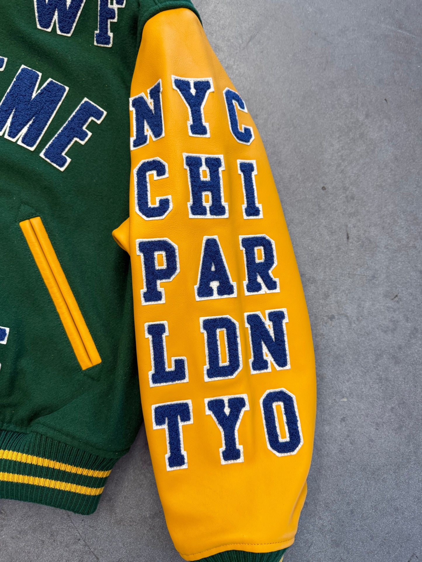 SS25 SUPREME PRAISES VARSITY JACKET - GREEN/YELLOW (NEW)