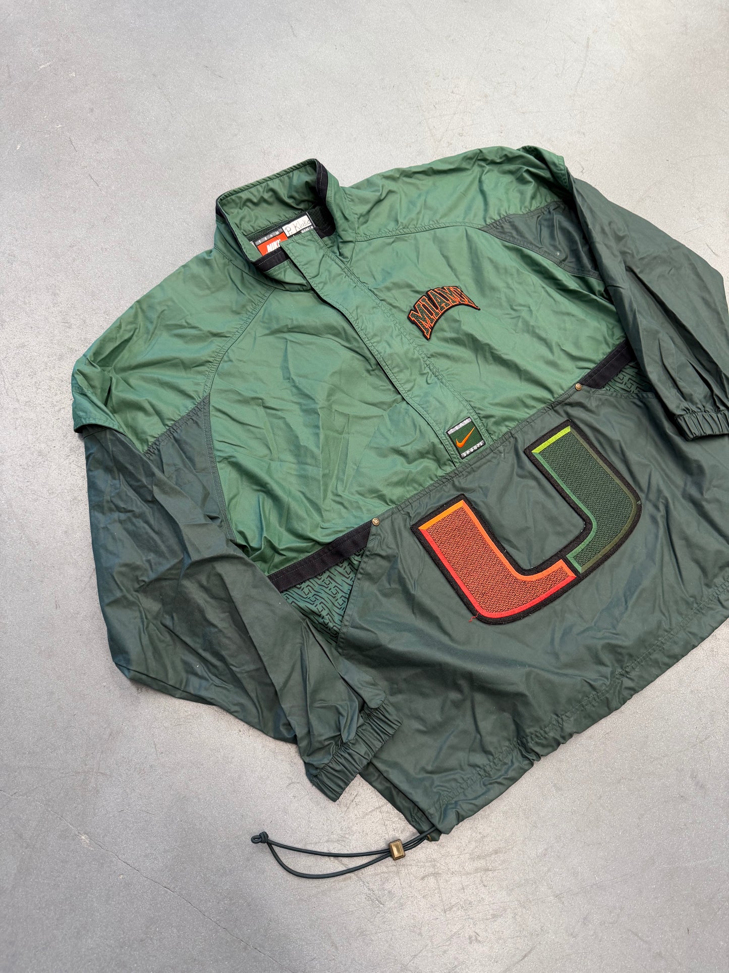 90S NIKE TEAM SPORTS UNIVERSITY OF MIAMI FOOTBALL HALF-ZIP WINDBREAKER JACKET