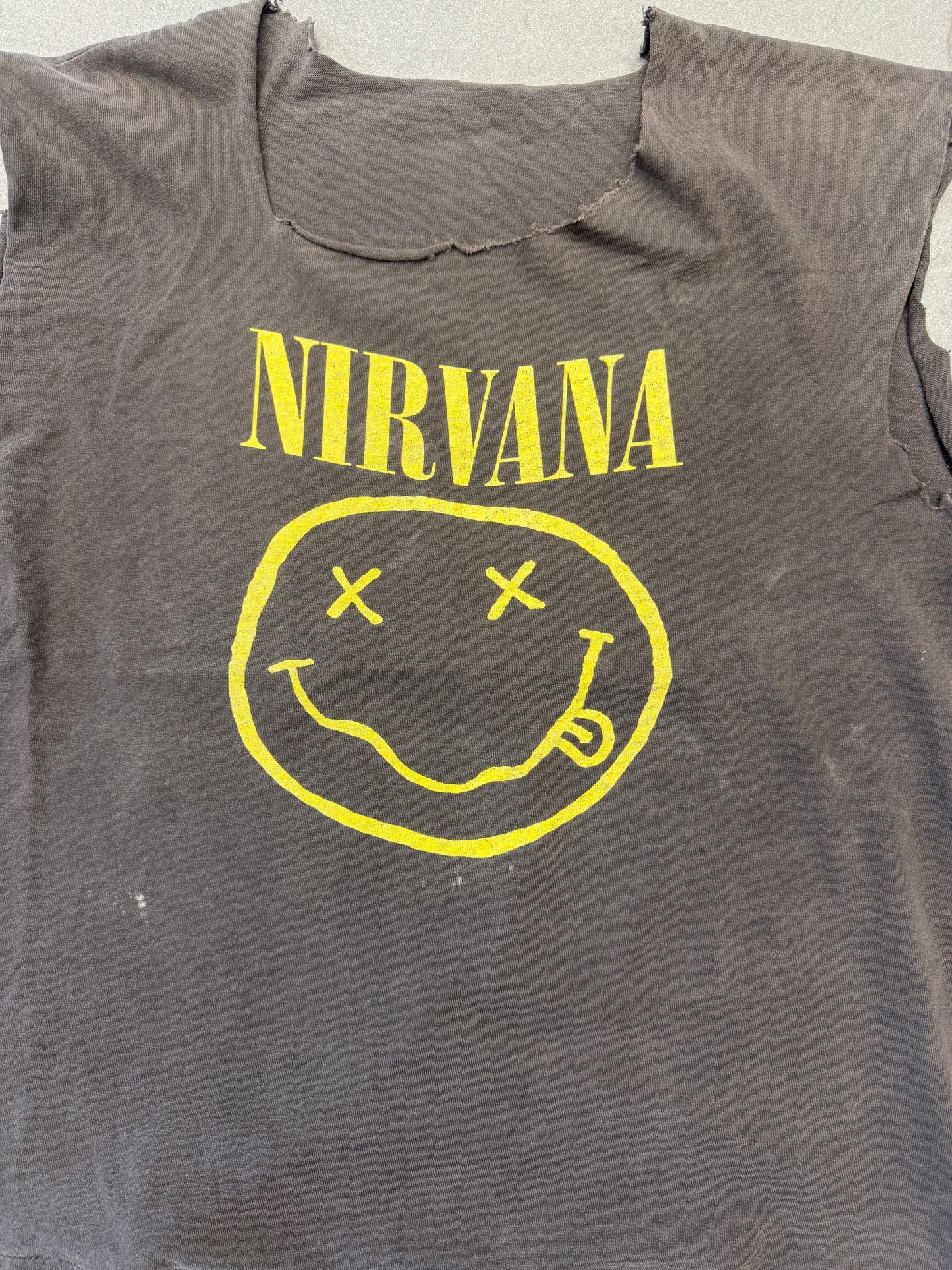 1992 NIRVANA "FLOWER SNIFFIN" SMILEY LOGO CUTOFF AND CUT NECK TEE (CUT TAG)