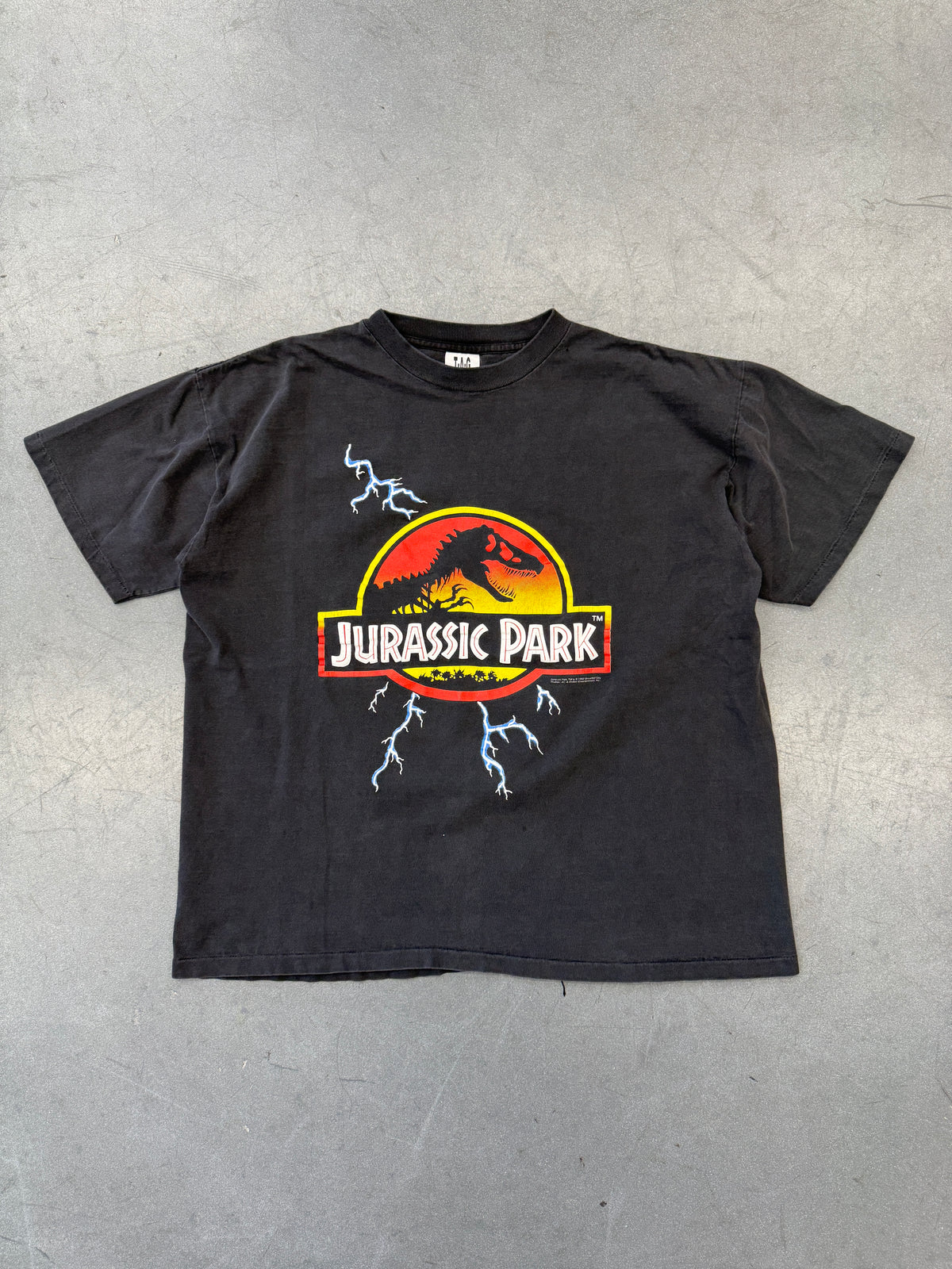 1992 JURASSIC PARK LIGHTNING TEE (T-A-G TAG)