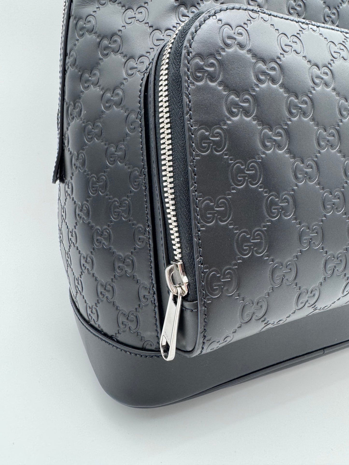 GUCCI SIGNATURE LEATHER BACKPACK