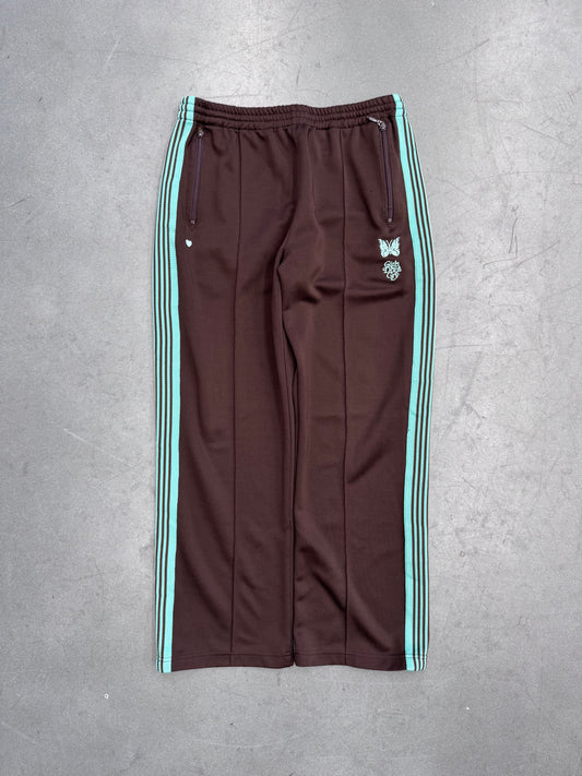 NEEDLES X GIRLS DON'T CRY TRACK PANTS
