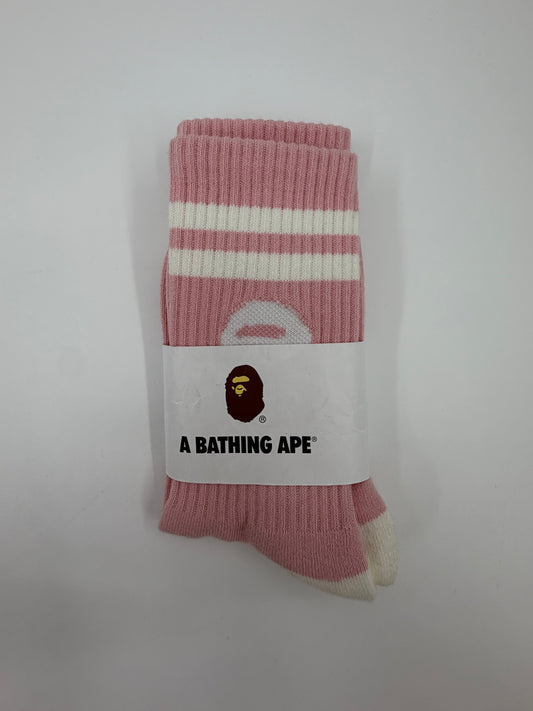 A BATHING APE PINK/WHITE STRIPED APE HEAD SOCKS