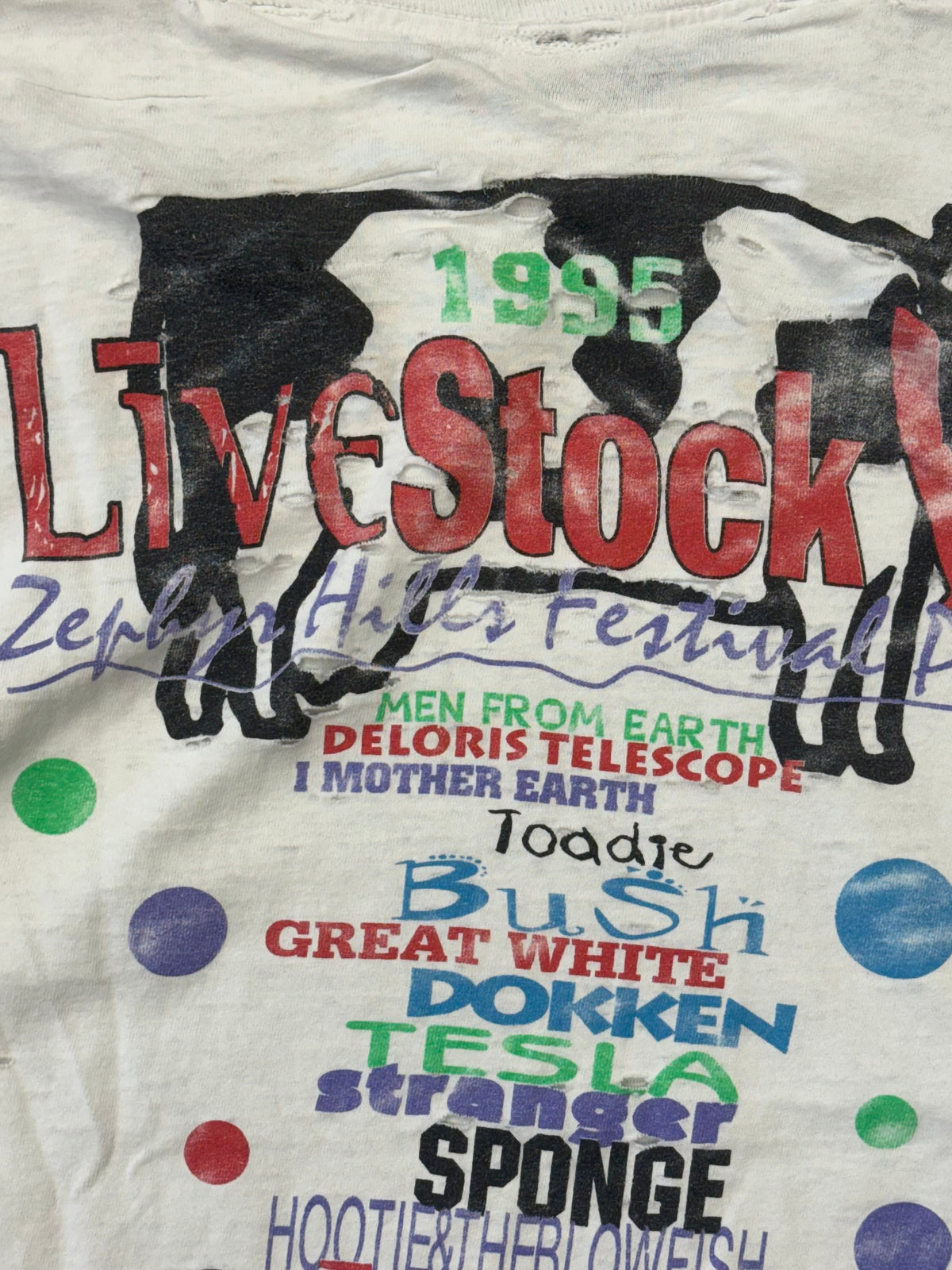 1995 LIVESTOCK V ZEPHYRHILLS FESTIVAL PARK THRASHED AND REPAIRED TEE (CUT FOTL TAG)