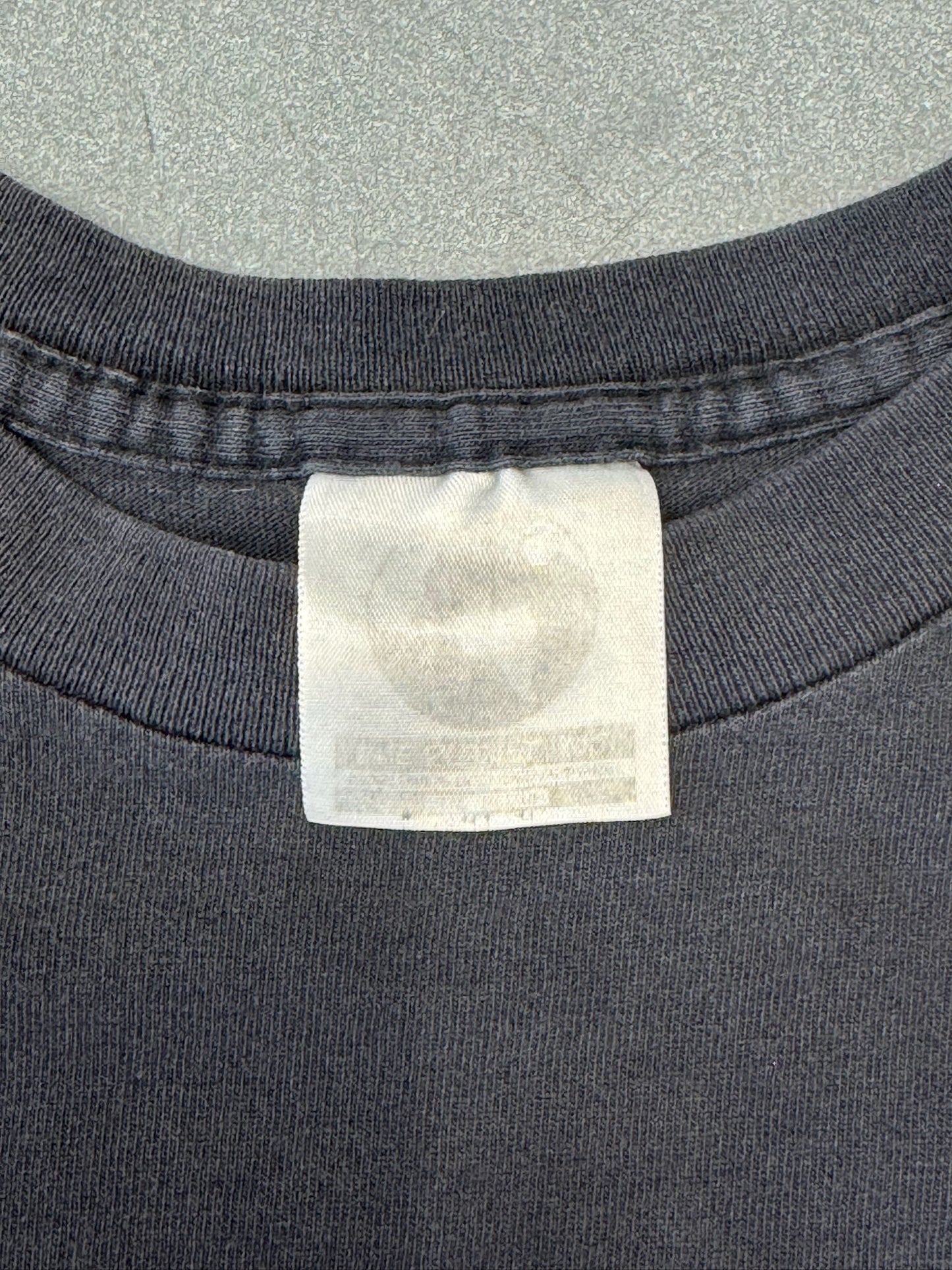90S NWO NEW WORLD ORDER NO MERCY TEE (FADED PLANET TAG)