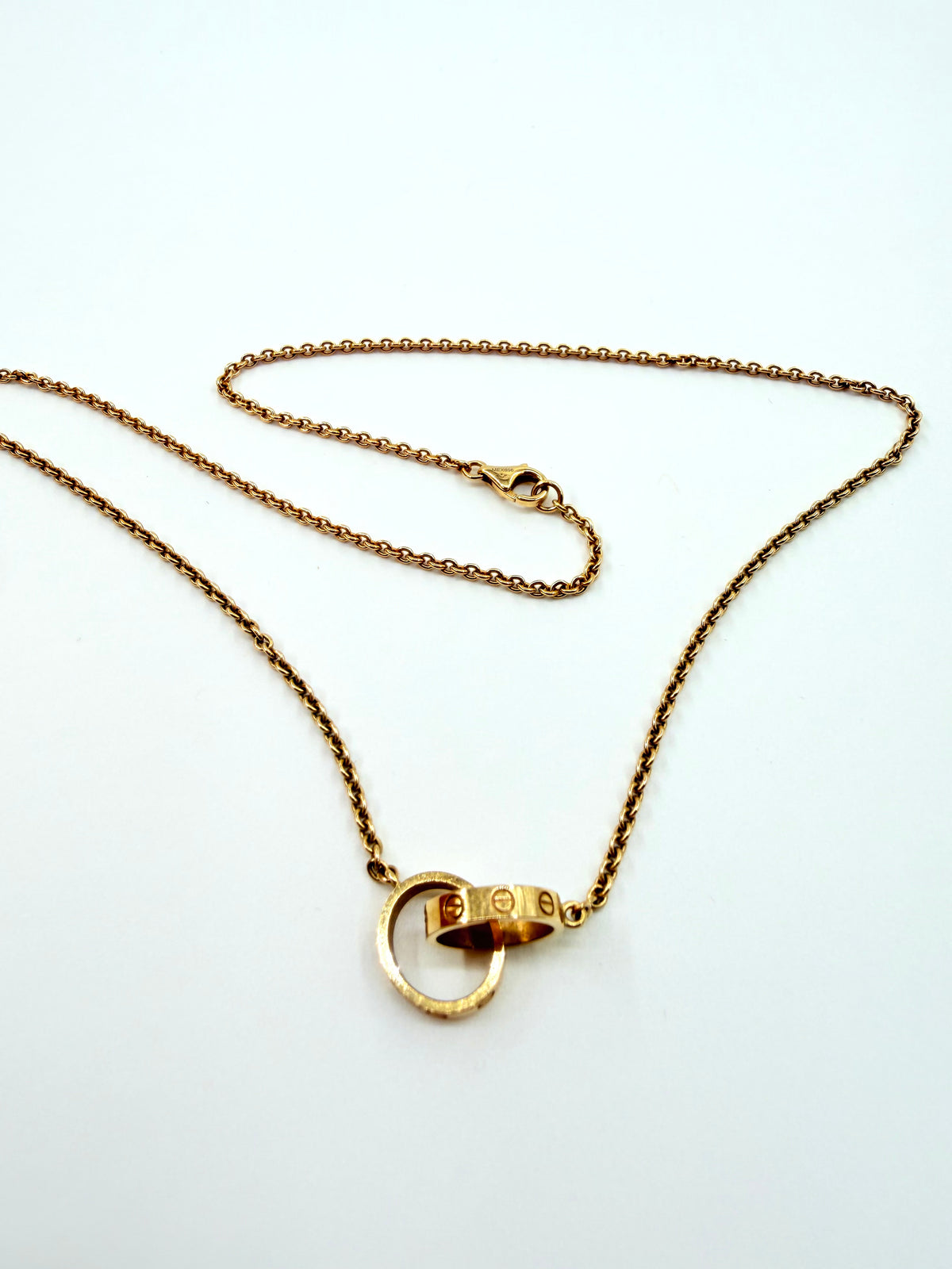 CARTIER 18K YELLOW GOLD LOVE INTERLOCKING TWO-RING NECKLACE