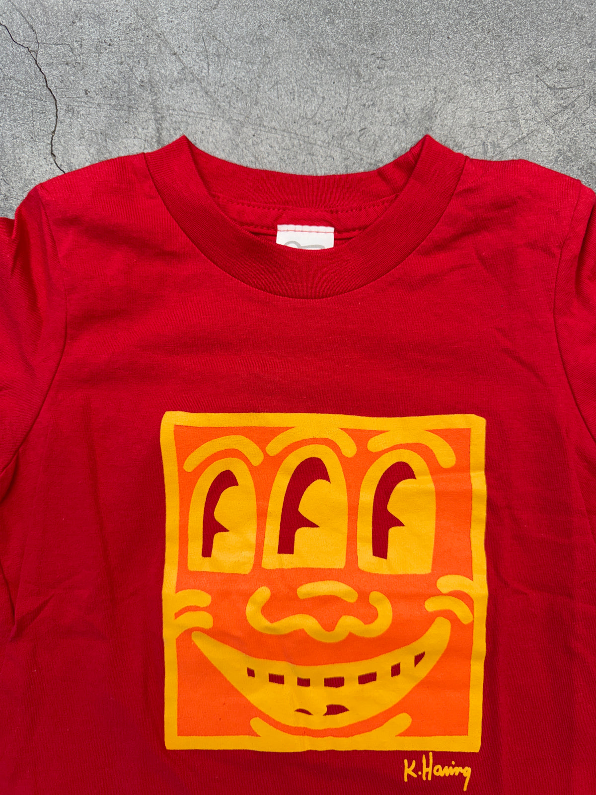 Y2K VINTAGE KEITH HARING THREE EYED FACE KIDS TEE (HARING BABY TAG)