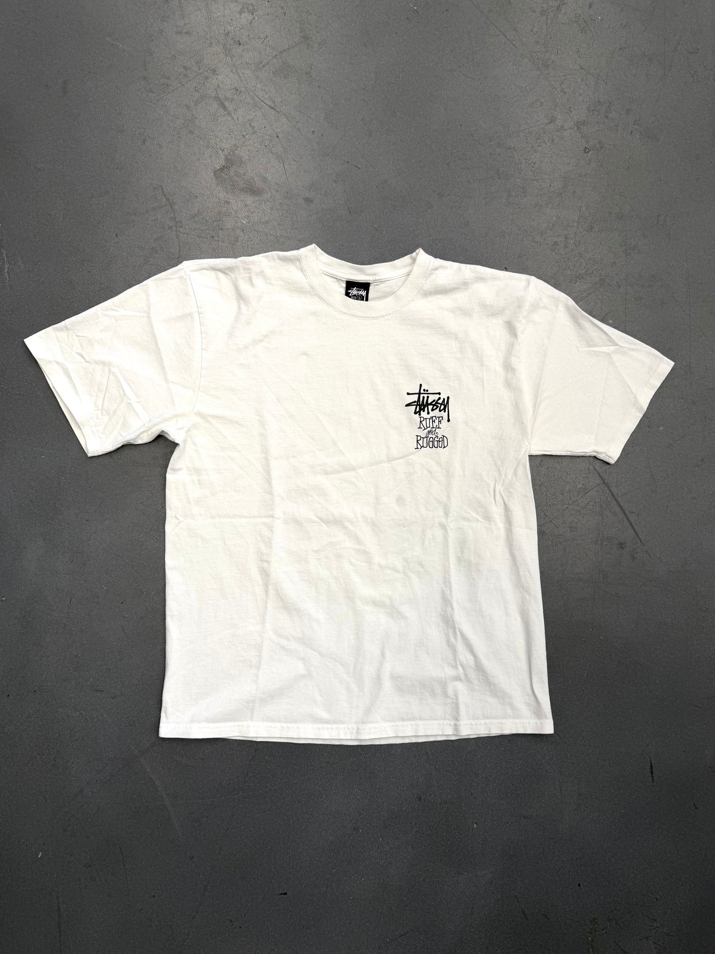 SS25 STUSSY WELL SUITED FOR THIS RUFF AND RUGGED WORLD TEE