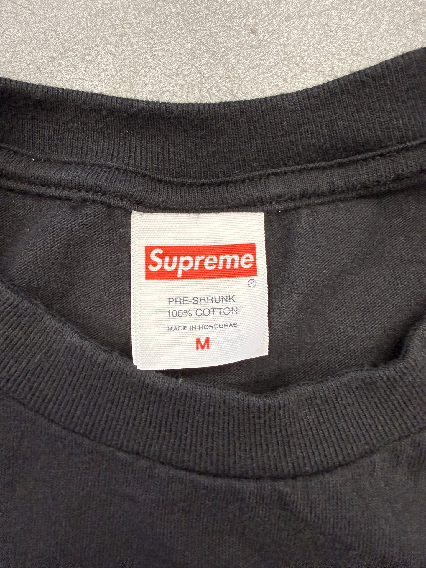 FW25 SUPREME STICK TEE - BLACK