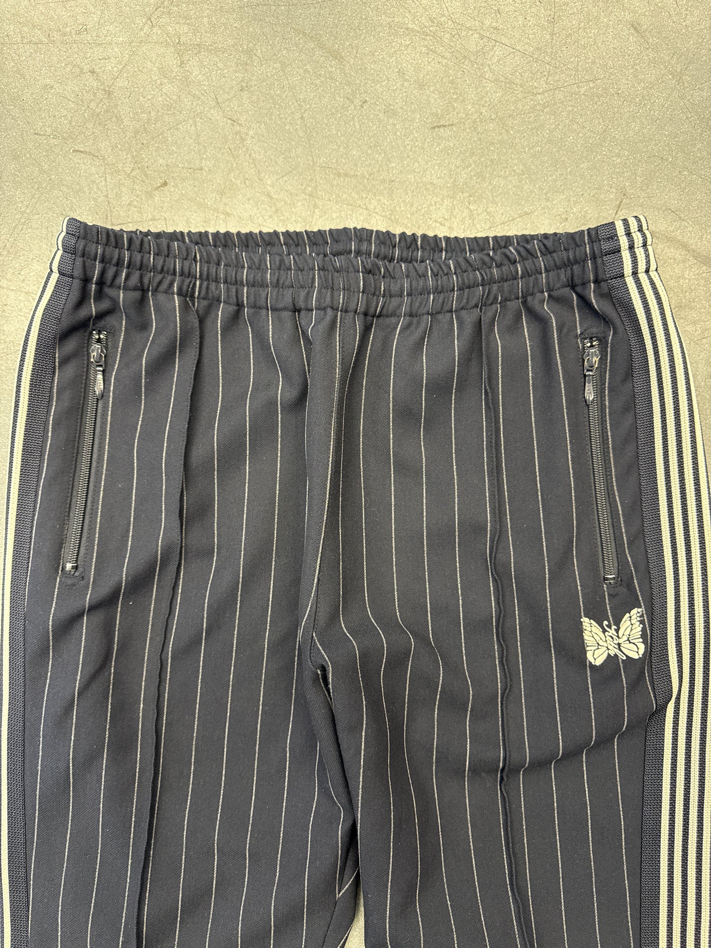 NEEDLES X KITH PINSTRIPE TRACK PANTS - BLUE