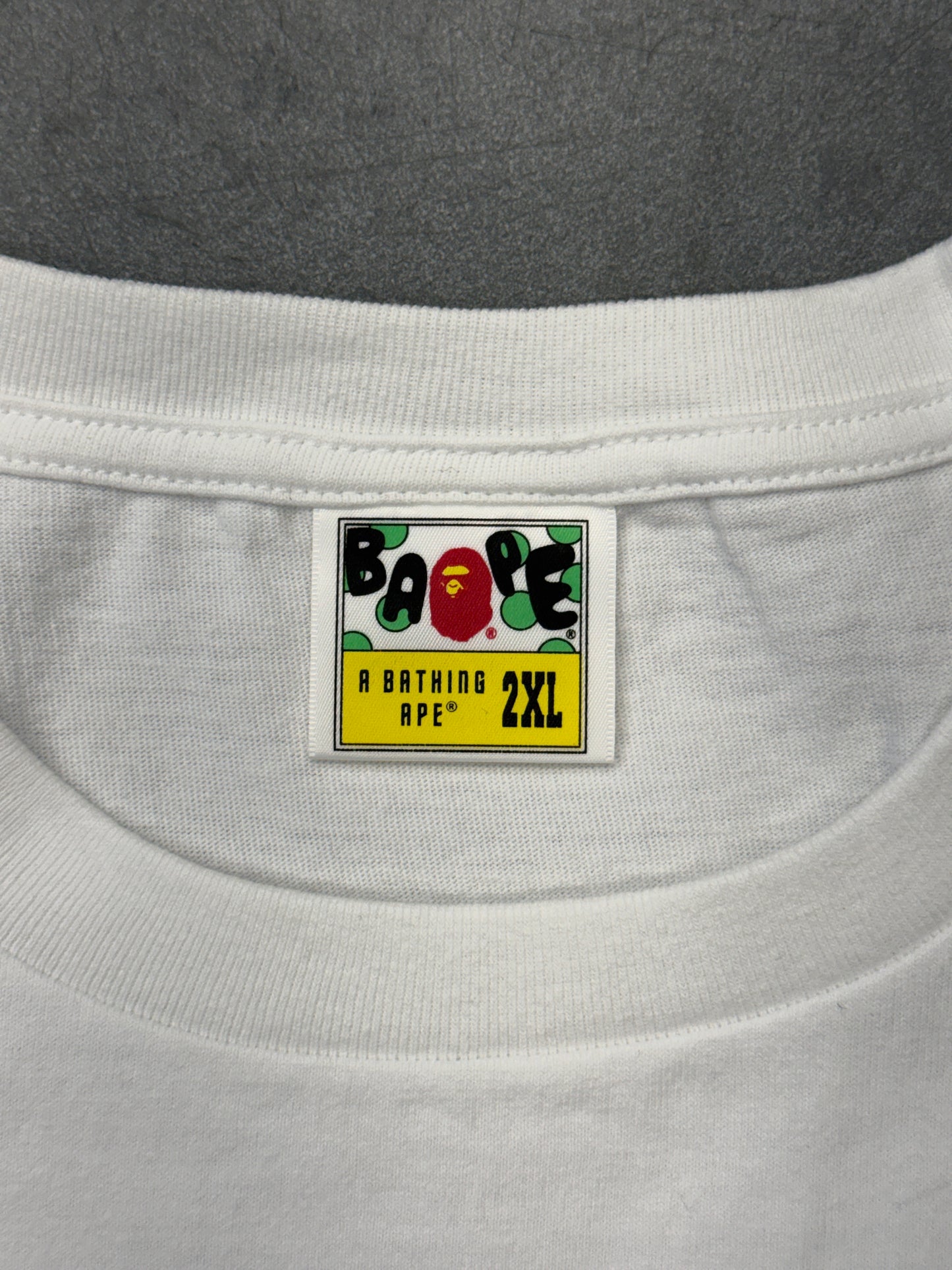 A BATHING APE BAPE MIXED CAMO COLLEGE BAPE LOGO TEE WHITE