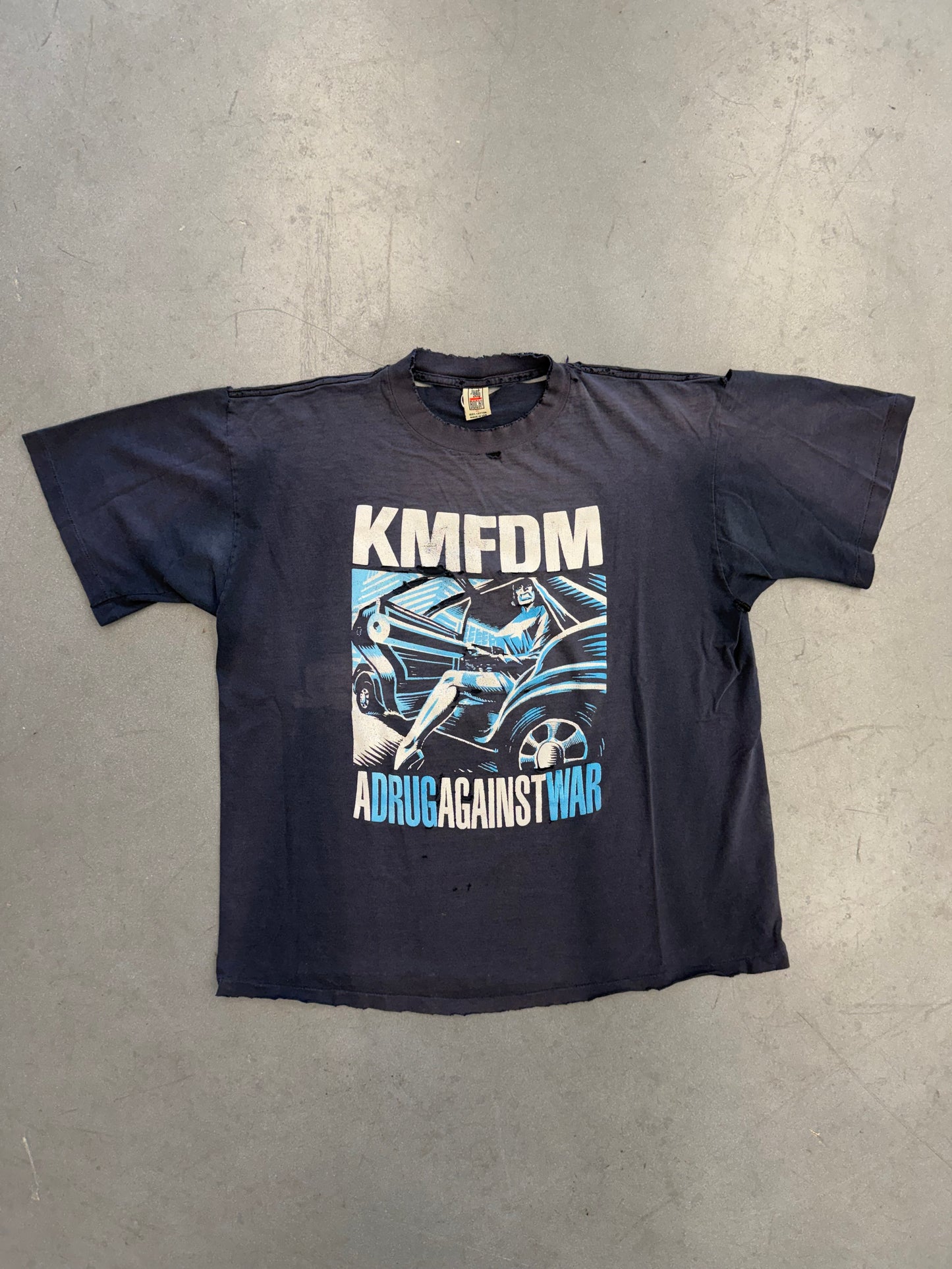 KMFDM A DRUG AGAINST WAR TEE (JUST SAY ROCK TAG)