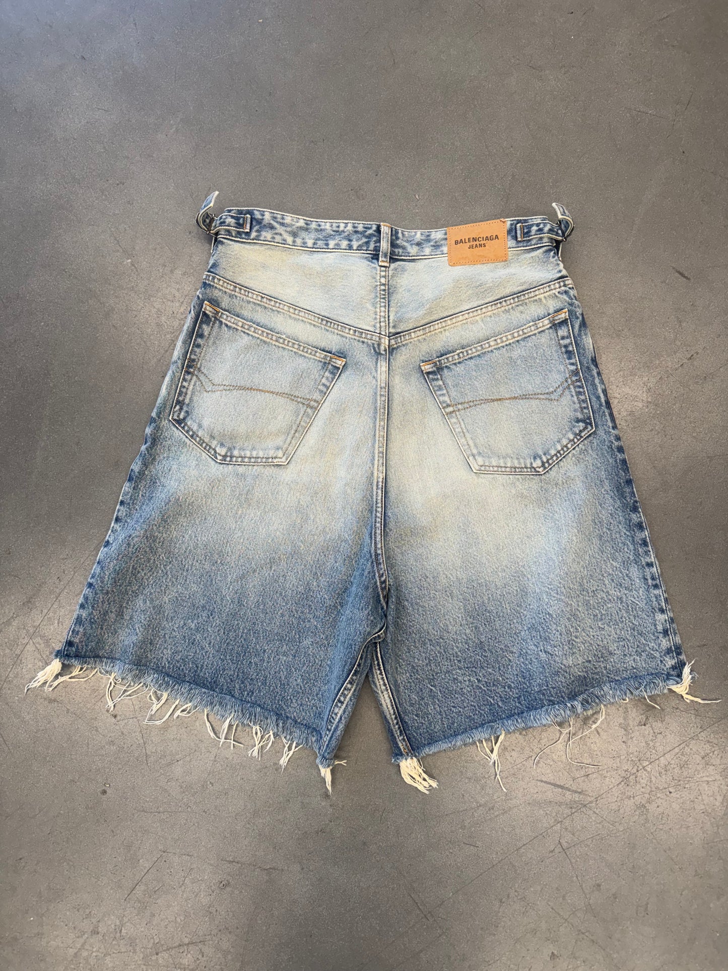BALENCIAGA SKATER WIDE-LEG DISTRESSED DENIM SHORTS