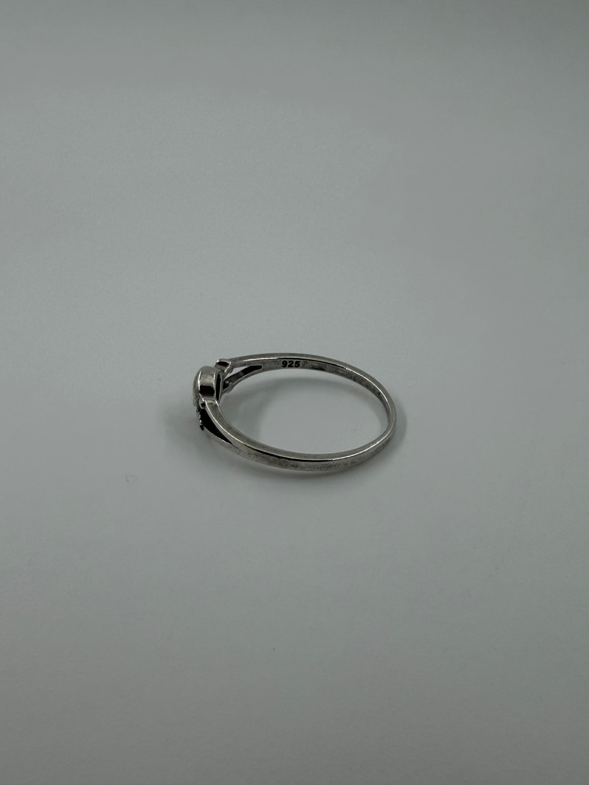 TINY SKULL AND CROSSBONES STERLING SILVER RING