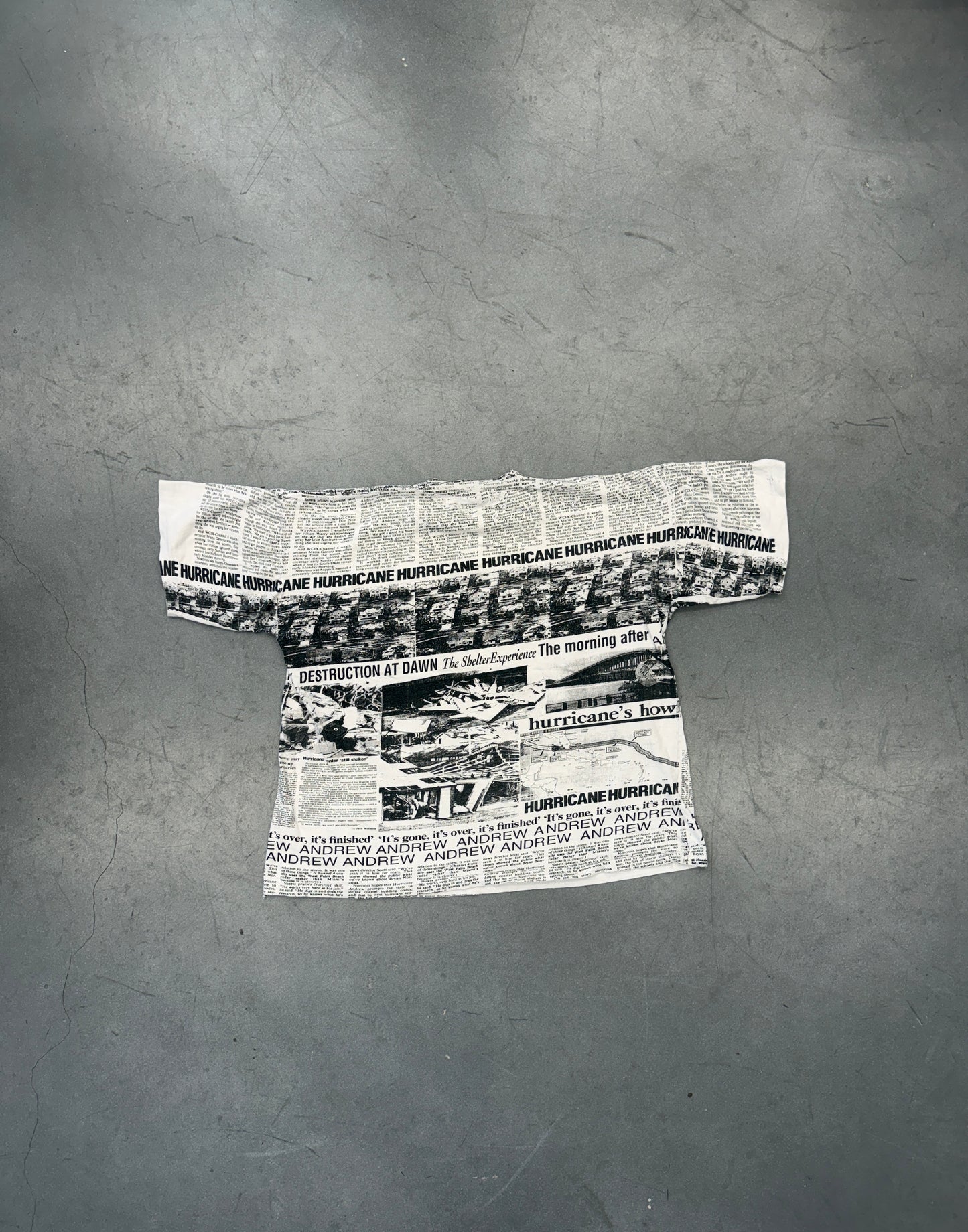 1992 HURRICANE ANDREW NEWSPAPER AOP TEE (TROPICAL GOLD TAG)
