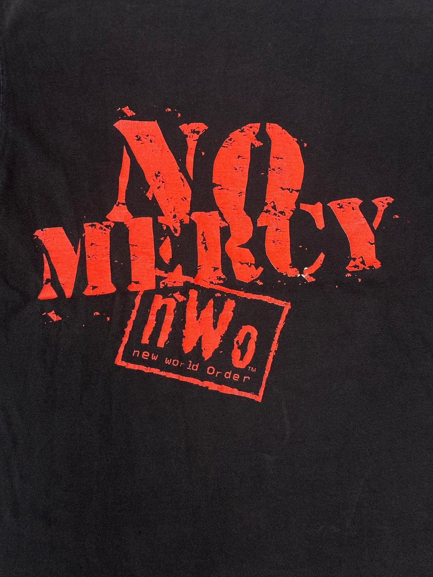 90S NWO NEW WORLD ORDER NO MERCY TEE (FADED PLANET TAG)