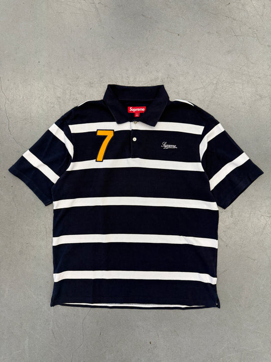 SS25 SUPREME CURSIVE POLO SHIRT - NAVY STRIPE