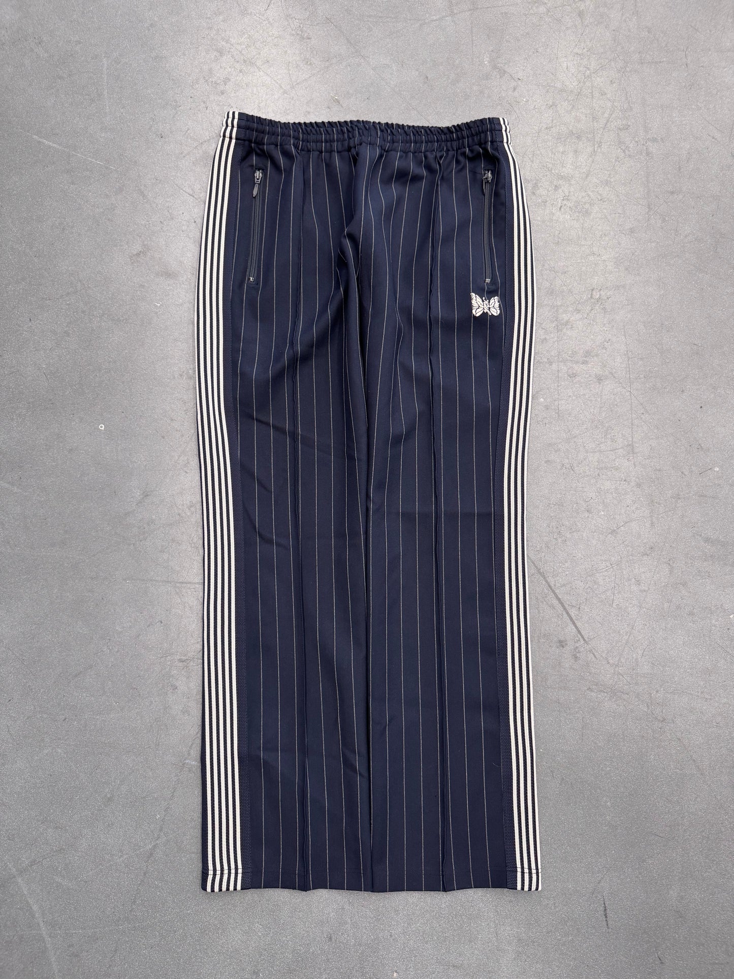 NEEDLES X KITH PINSTRIPE TRACK PANTS