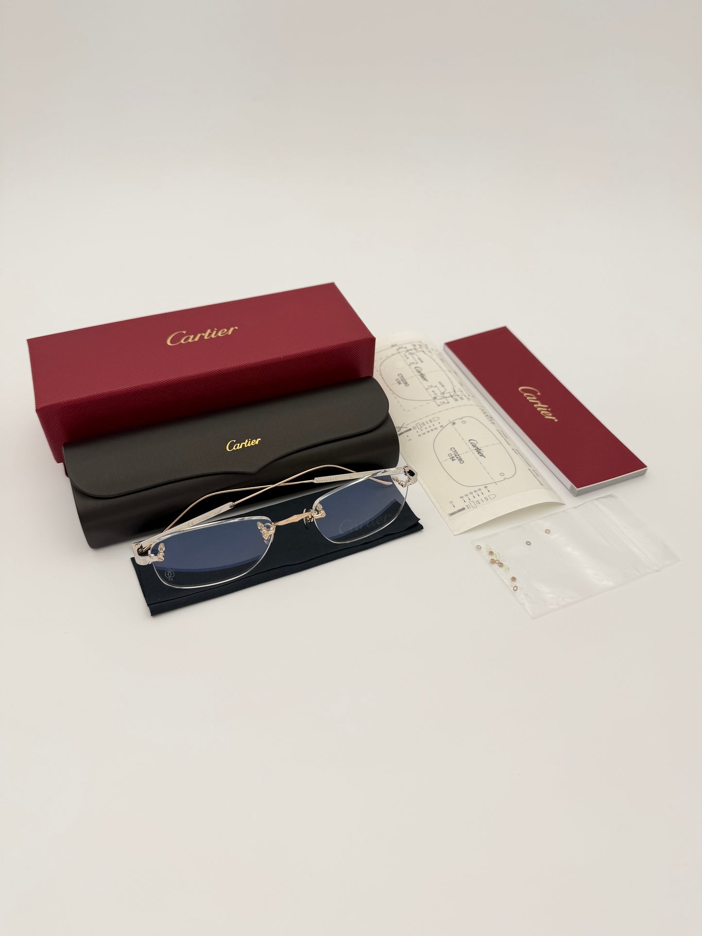 CARTIER K0WKE00270 FRAMELESS GLASSES (W/ BOX AND CASE)