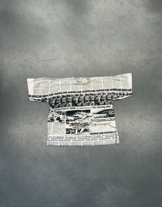 1992 HURRICANE ANDREW NEWSPAPER AOP TEE (TROPICAL GOLD TAG)
