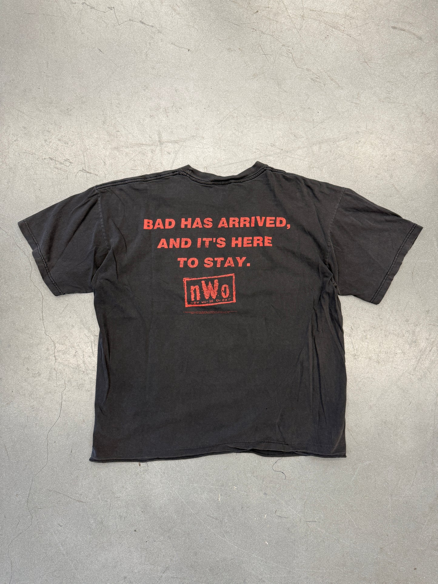 1998 NWO BAD HAS ARRIVED, AND IT'S HERE TO STAY TEE (CHAMP TAG)