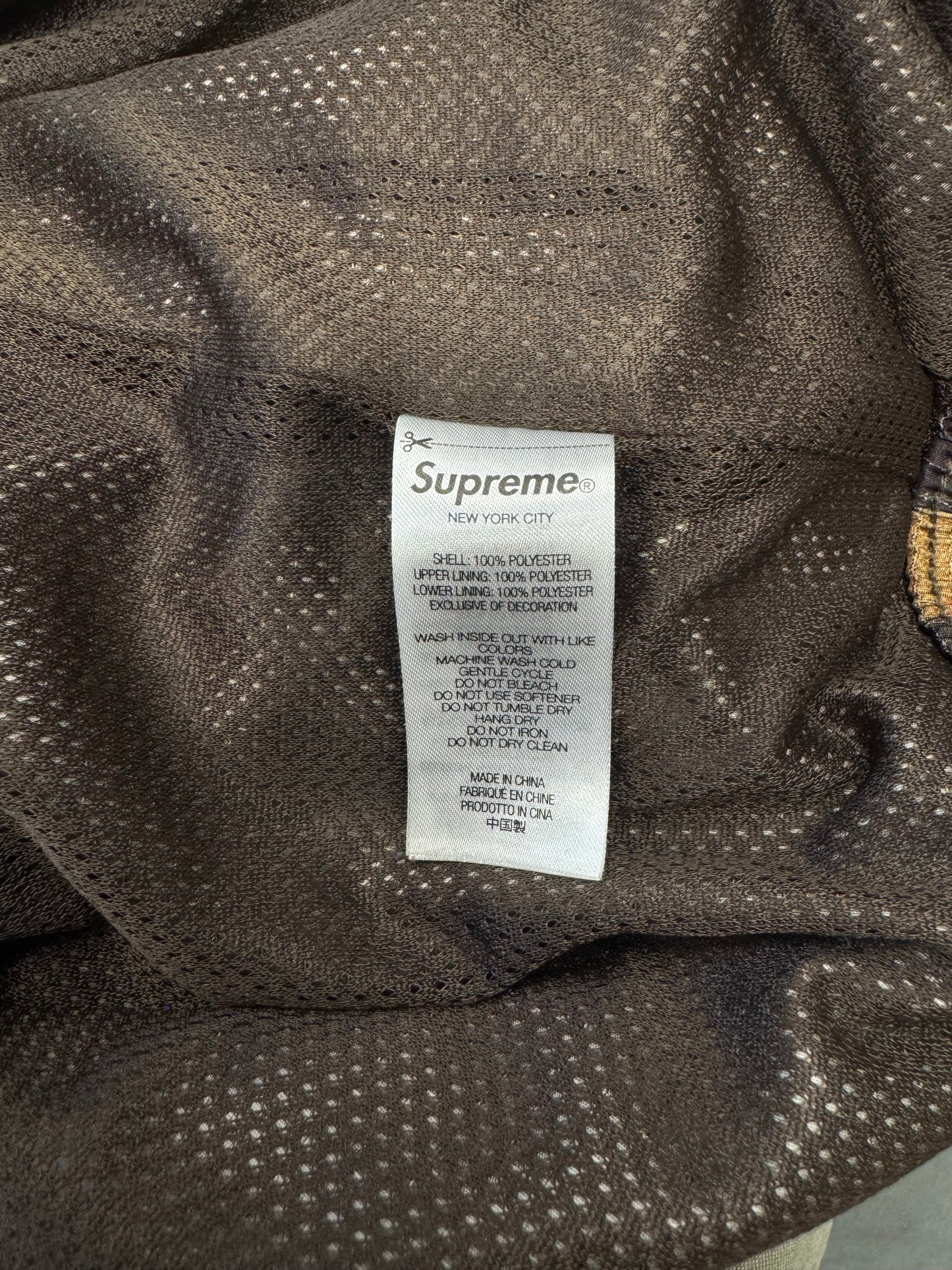 SS25 SUPREME REFLECTIVE RIPSTOP TRACK PANTS