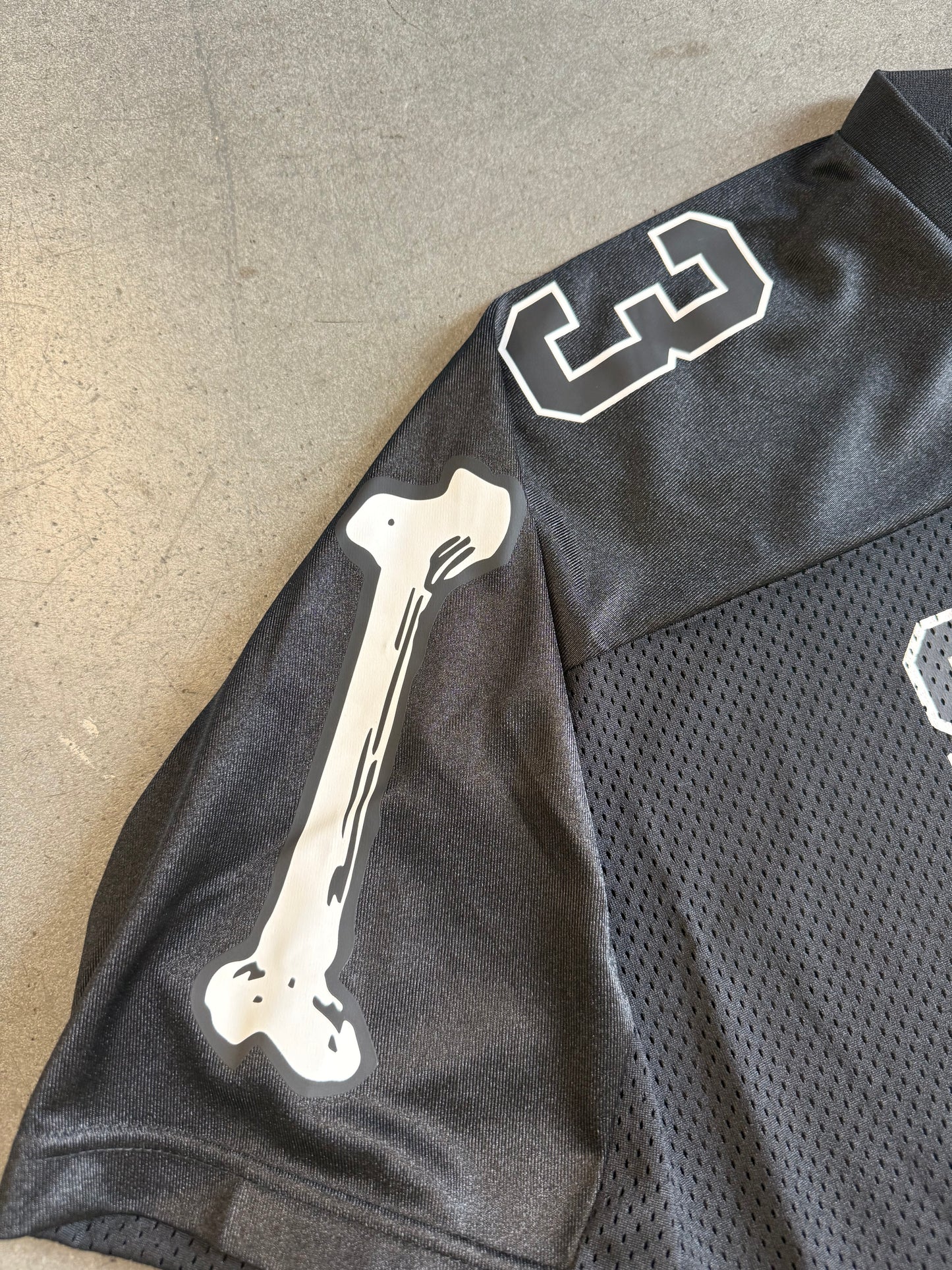 FW25 SUPREME BONES FOOTBALL JERSEY - BLACK (L) (NEW)