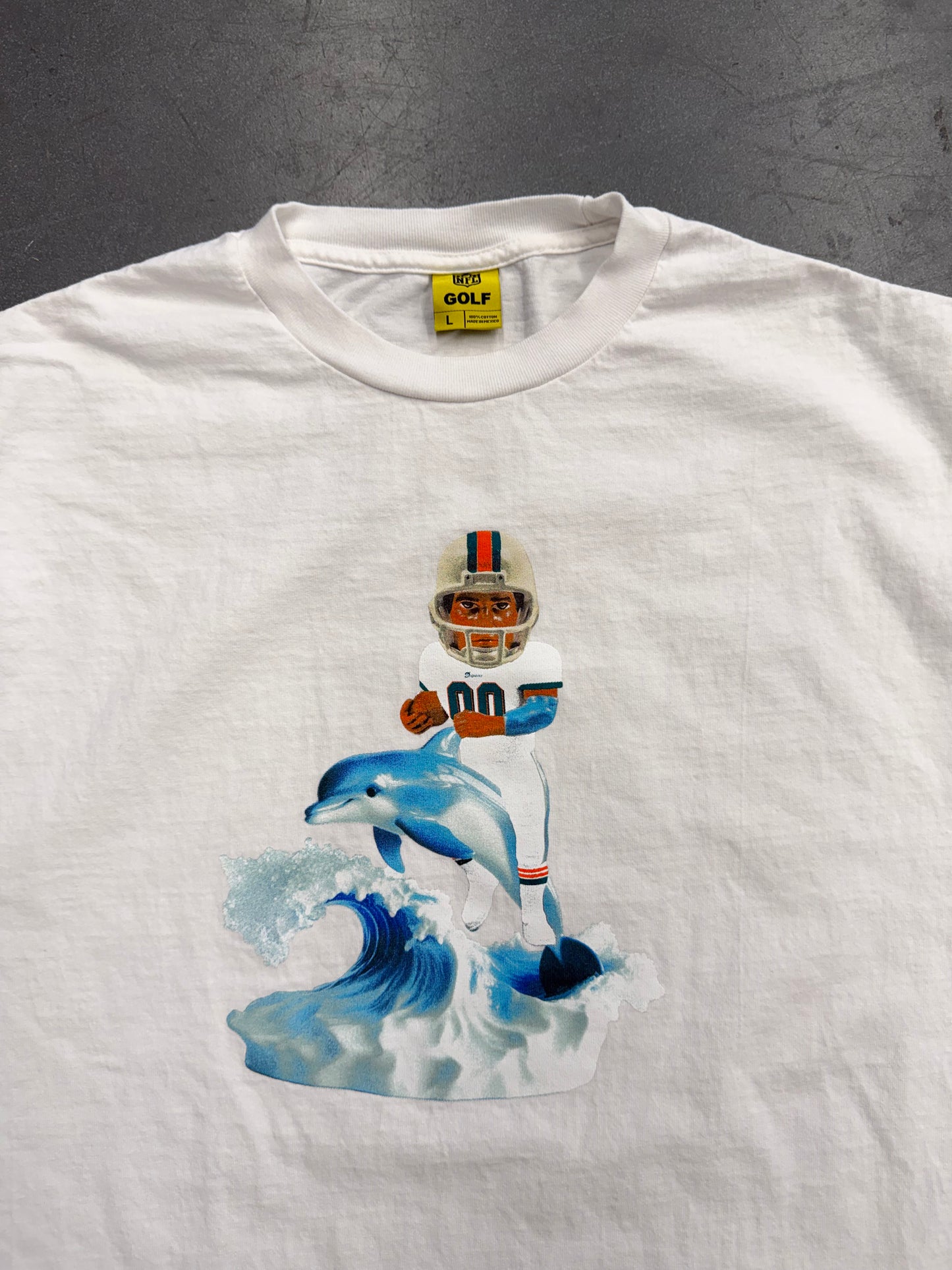 2025 TYLER THE CREATOR BOBBLEHEAD MIAMI DOLPHINS TEE (NFL GOLF TAG)