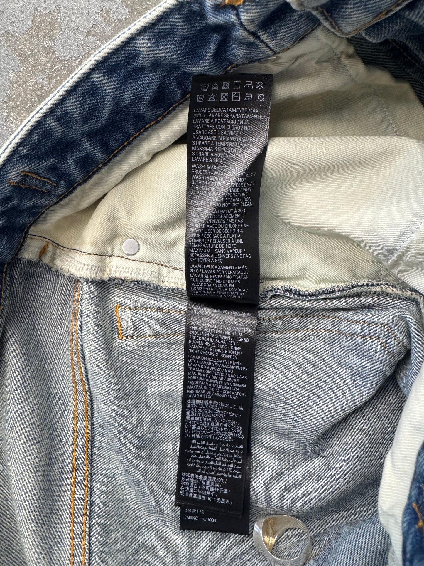 BALENCIAGA SKATER WIDE-LEG DISTRESSED DENIM SHORTS