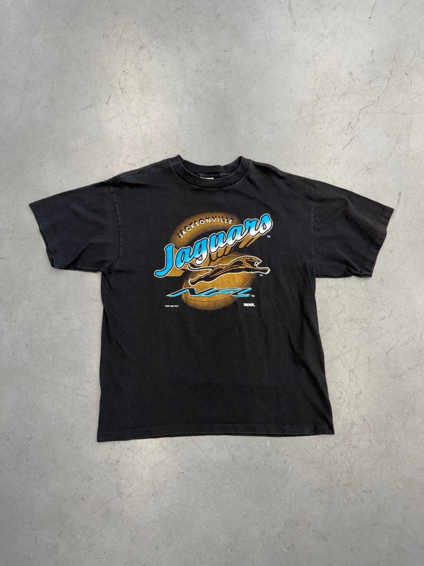 1993 JACKONSVILLE JAGUARS LOGO IN FRONT OF FOOTBALL TEE (TRENCH TAG)