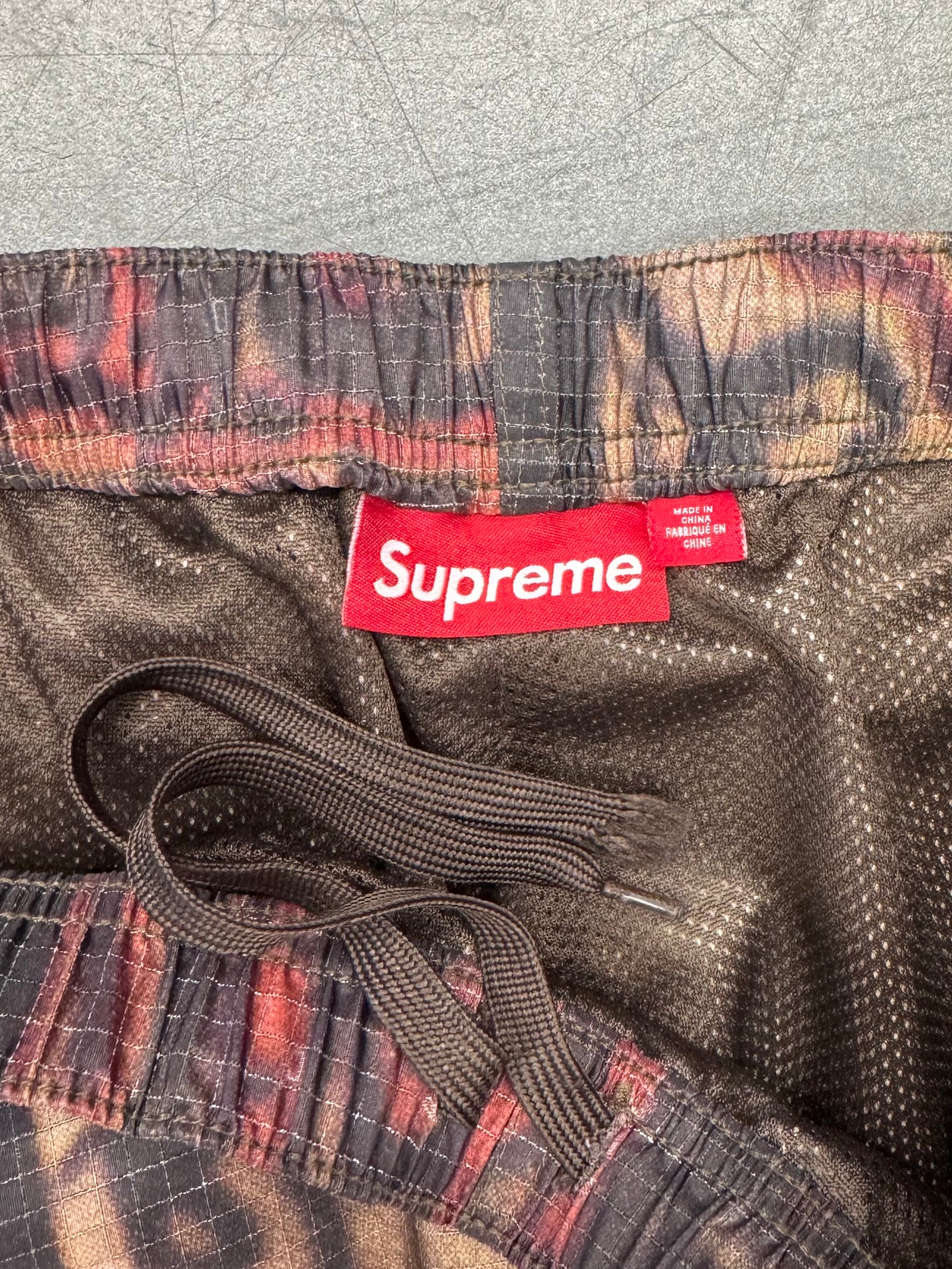 SS25 SUPREME REFLECTIVE RIPSTOP TRACK PANTS