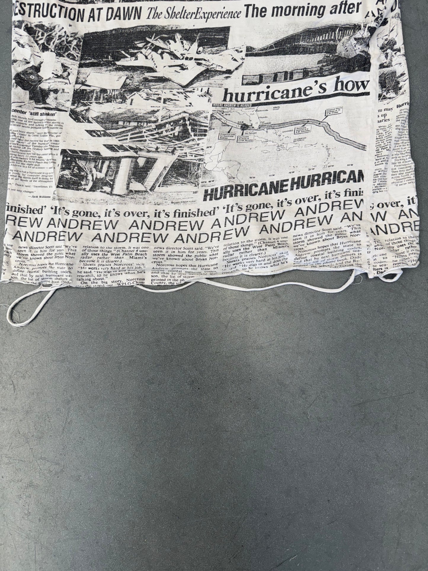 90S HURRICANE ANDREW SHREDDED NEWSPAPER TEE (FADED TAG)