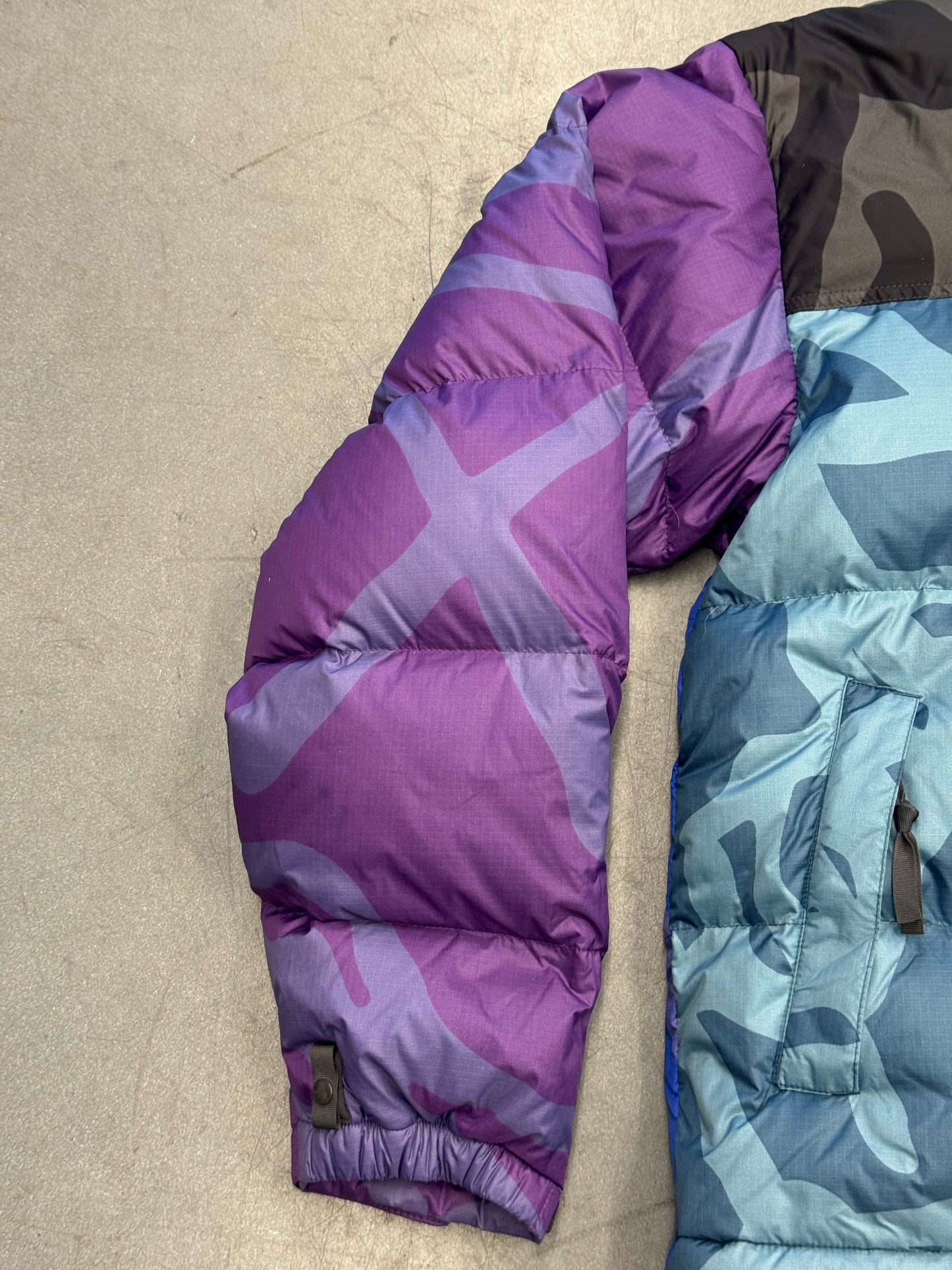 KAWS X THE NORTH FACE RETRO 1996 JACKET - MONTEREY BLUE NUPTSE PRINT