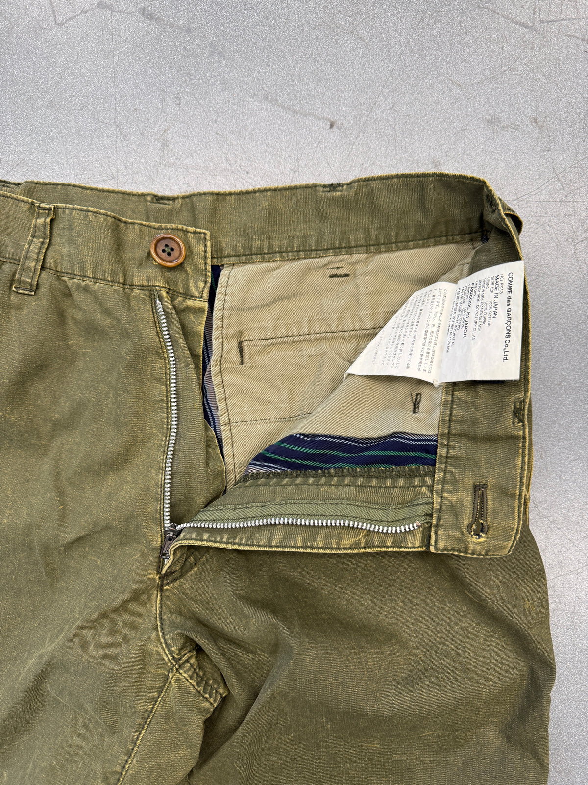 SD04 COMMES DES GARCONS HOMME WASHED OLIVE COTTON TROUSERS