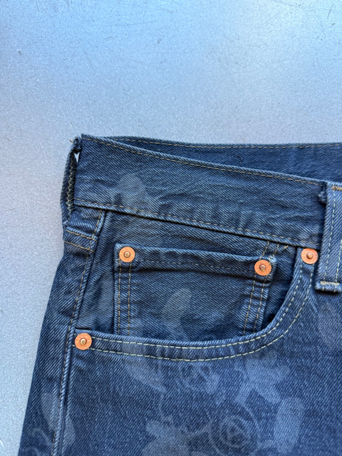 LEVI'S X VERDY CUSTOM ART BASEL JEANS RED BACK TAB