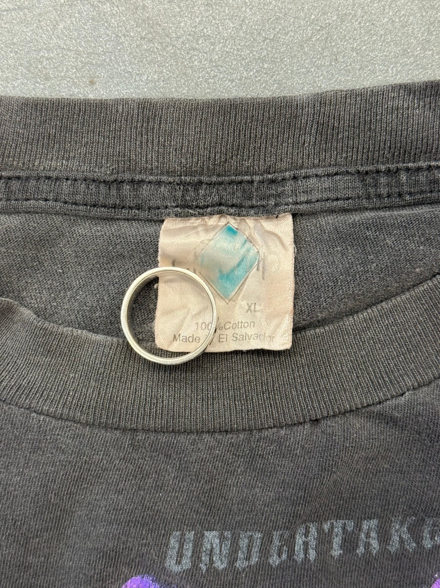 1994 UNDERTAKER R.I.P. GUESS WHO'S BACK TEE (TOUR CHAMP TAG)