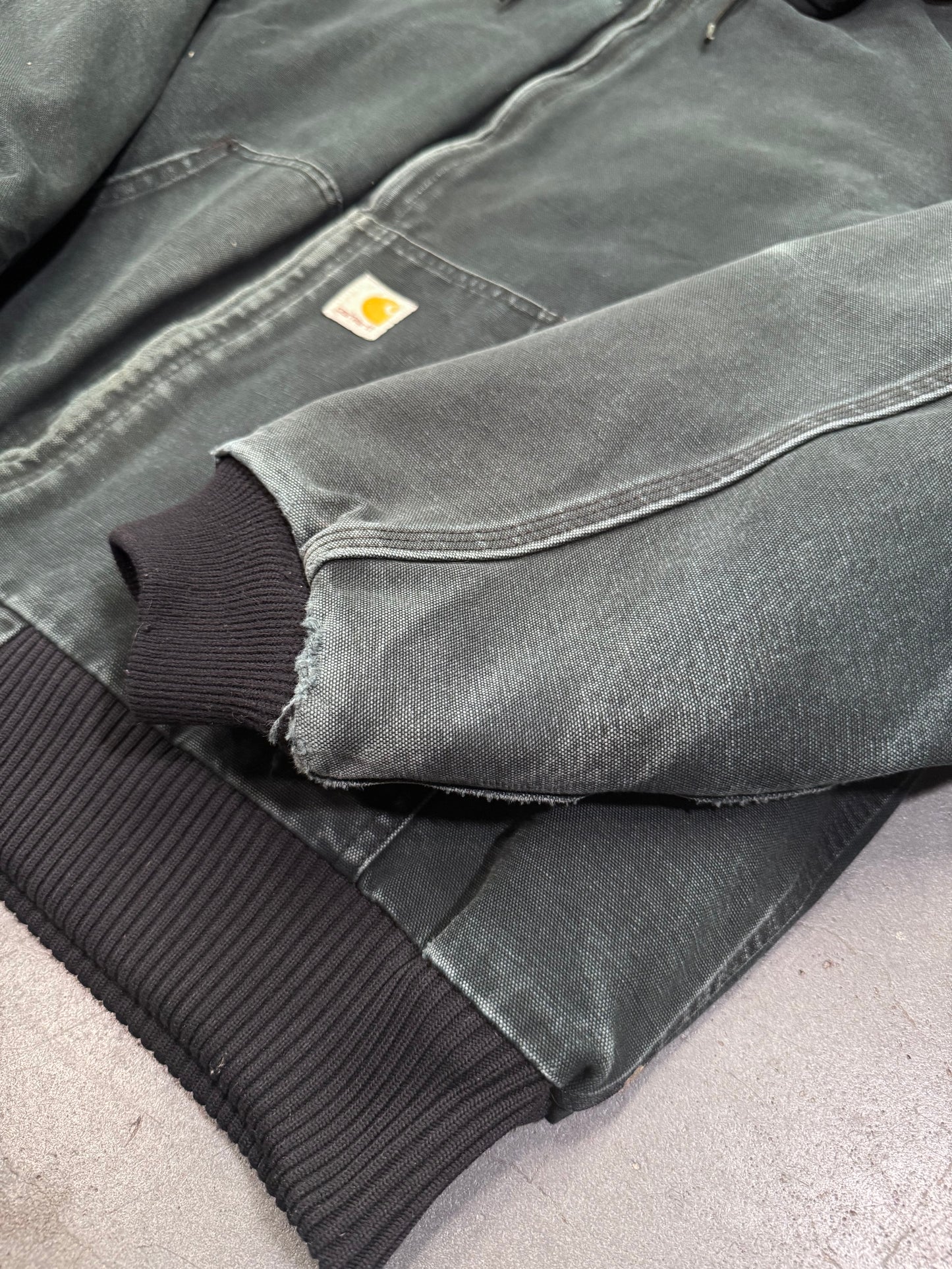2000'S CARHARTT INSULATED CANVAS HOODIE - DARK GREEN (BLACK WAIST CUFF) (FADED TAGS XL)