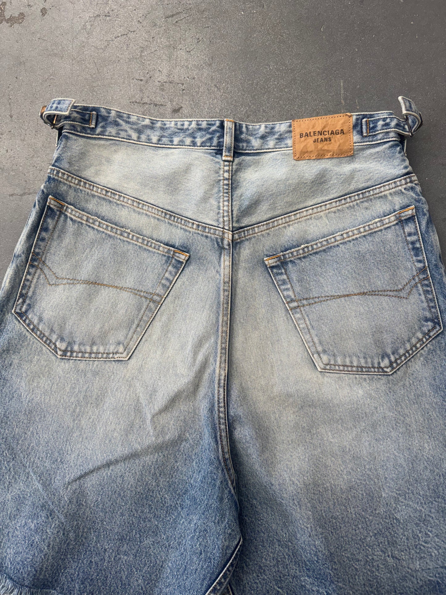 BALENCIAGA SKATER WIDE-LEG DISTRESSED DENIM SHORTS
