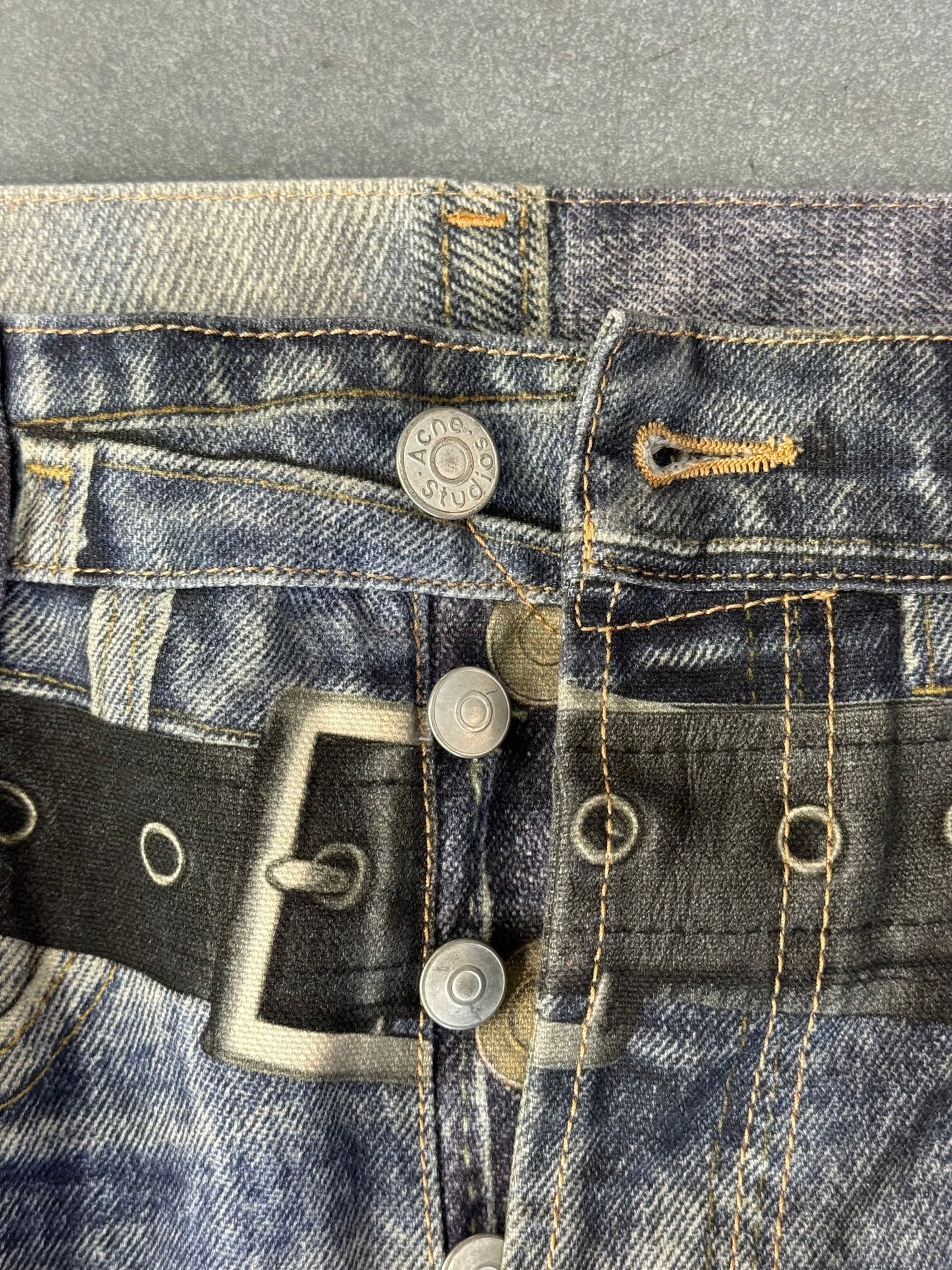 ACNE STUDIOS LEATHER CHAPS PRINTED JEANS