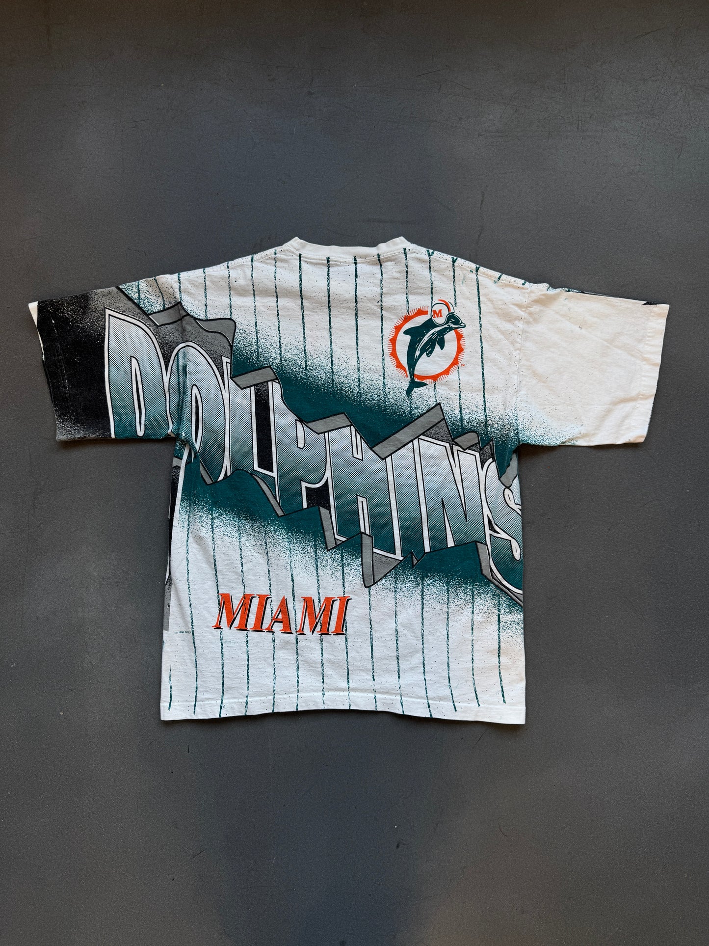 1994 AOP MIAMI DOLPHINS STRIPED WRAP-AROUND SPELLOUT TEE (TRUE FAN TAG)