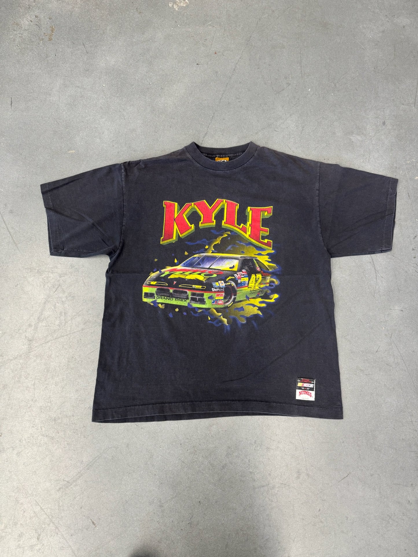 1993 NUTMEG NASCAR KYLE PETTY BREAKTHROUGH TEE (NUTMEG TAG)