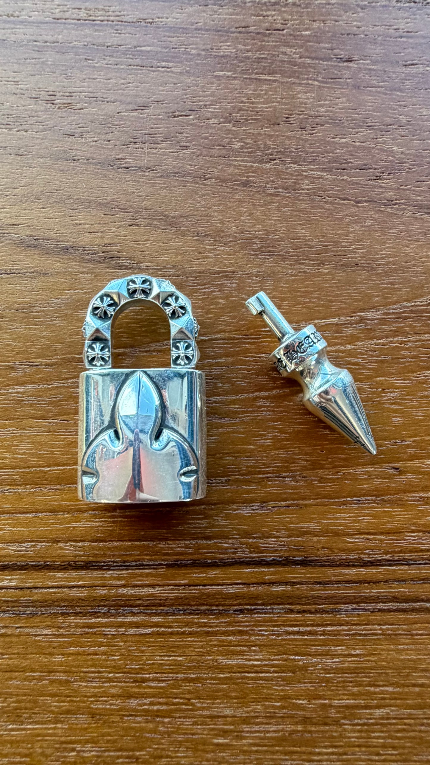 CHROME HEARTS LOVE'S NOT DEAD SILVER FLEUR LOCK PENDANT AND SPIKE KEY
