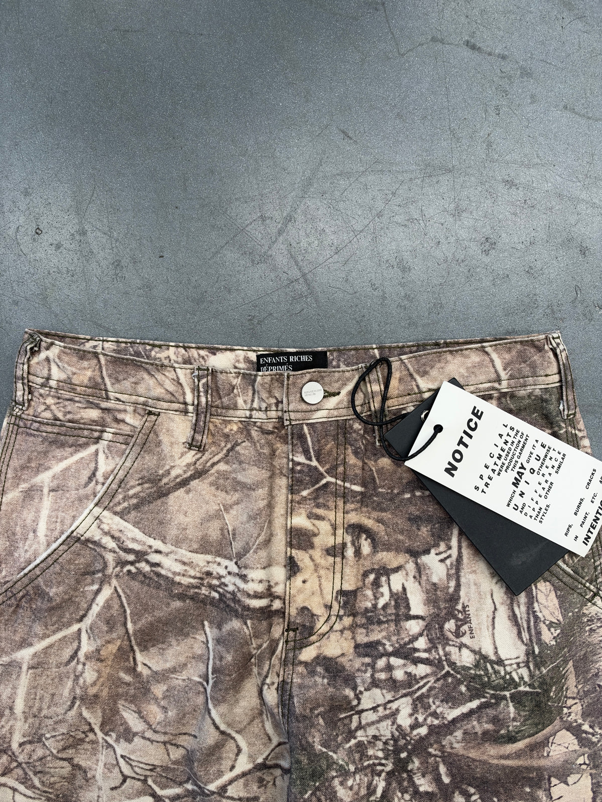 FW23 ENFANTS RICHES DEPRIMES REALTREE CAMO CARPENTER PANTS