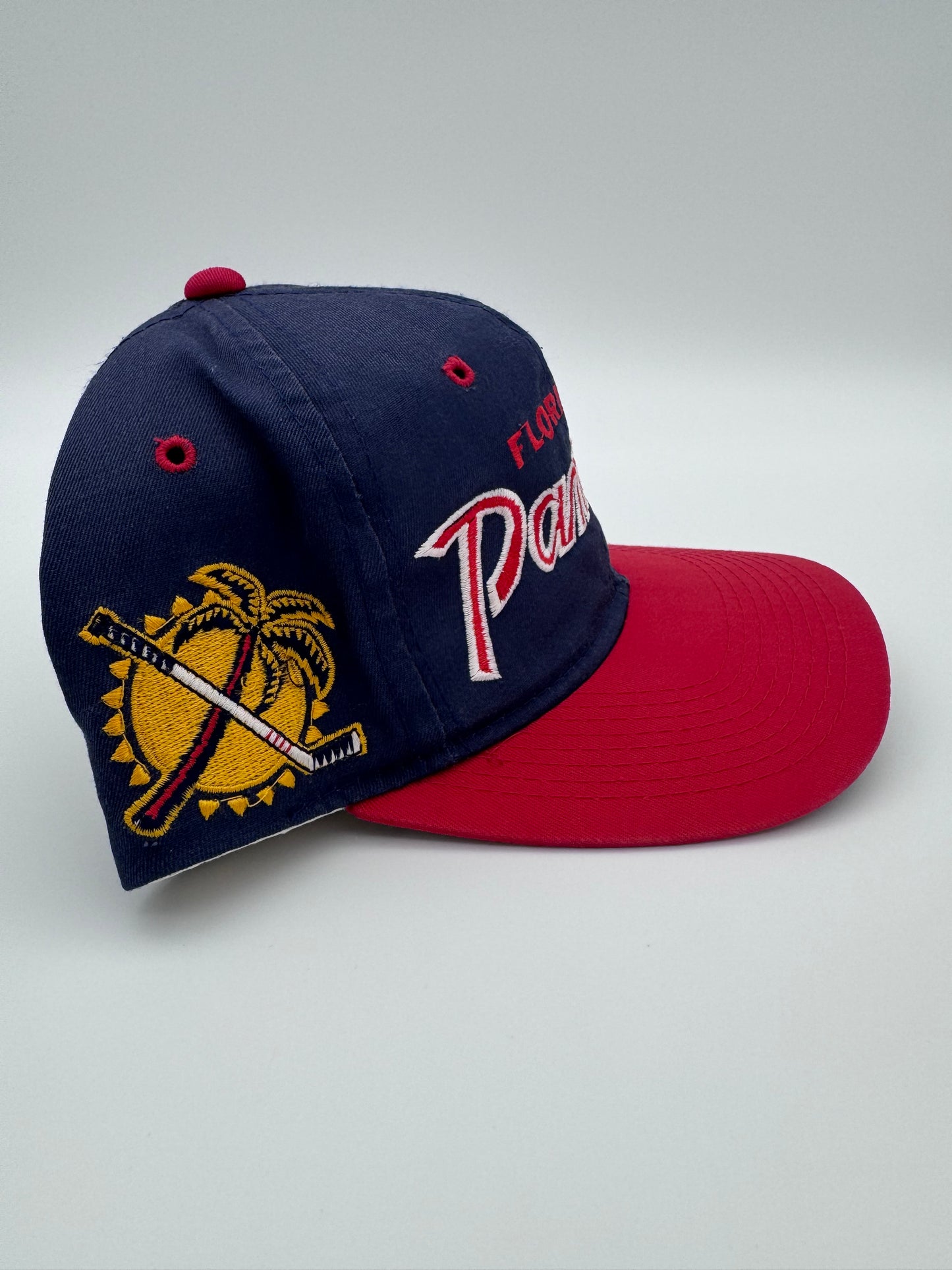 90S FLORIDA PANTHERS SCRIPT SPORTS SPECIALTIES SNAPBACK HAT NAVY THE TWILL